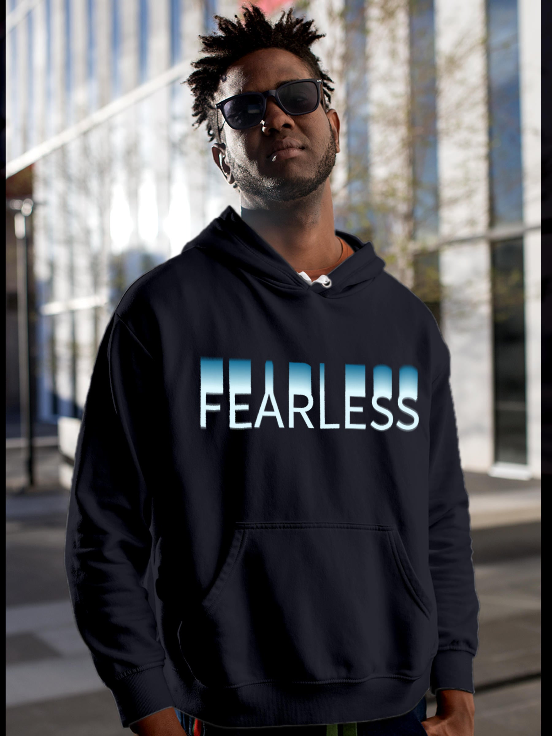 Model wearing Men's Navy Blue Hoodie Sweatshirt with 'Fearless' design, offering effortless style and premium comfort