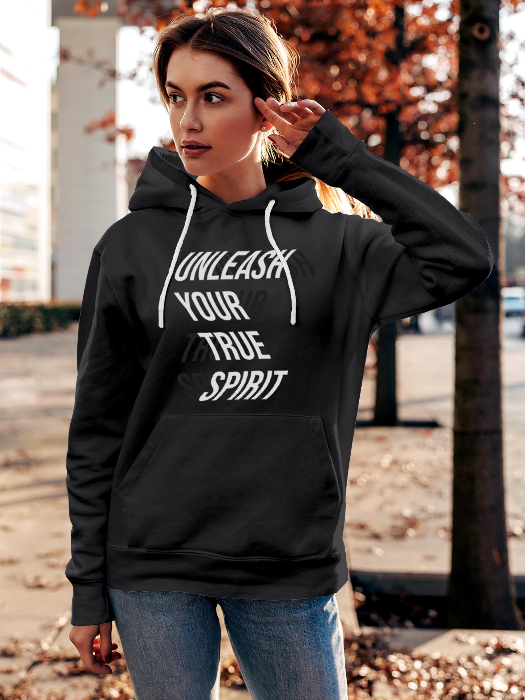 Model wearing Women's Dark Grey Hoodie Sweatshirt with 'Unleash Your True Spirit' design, offering effortless style and premium comfort