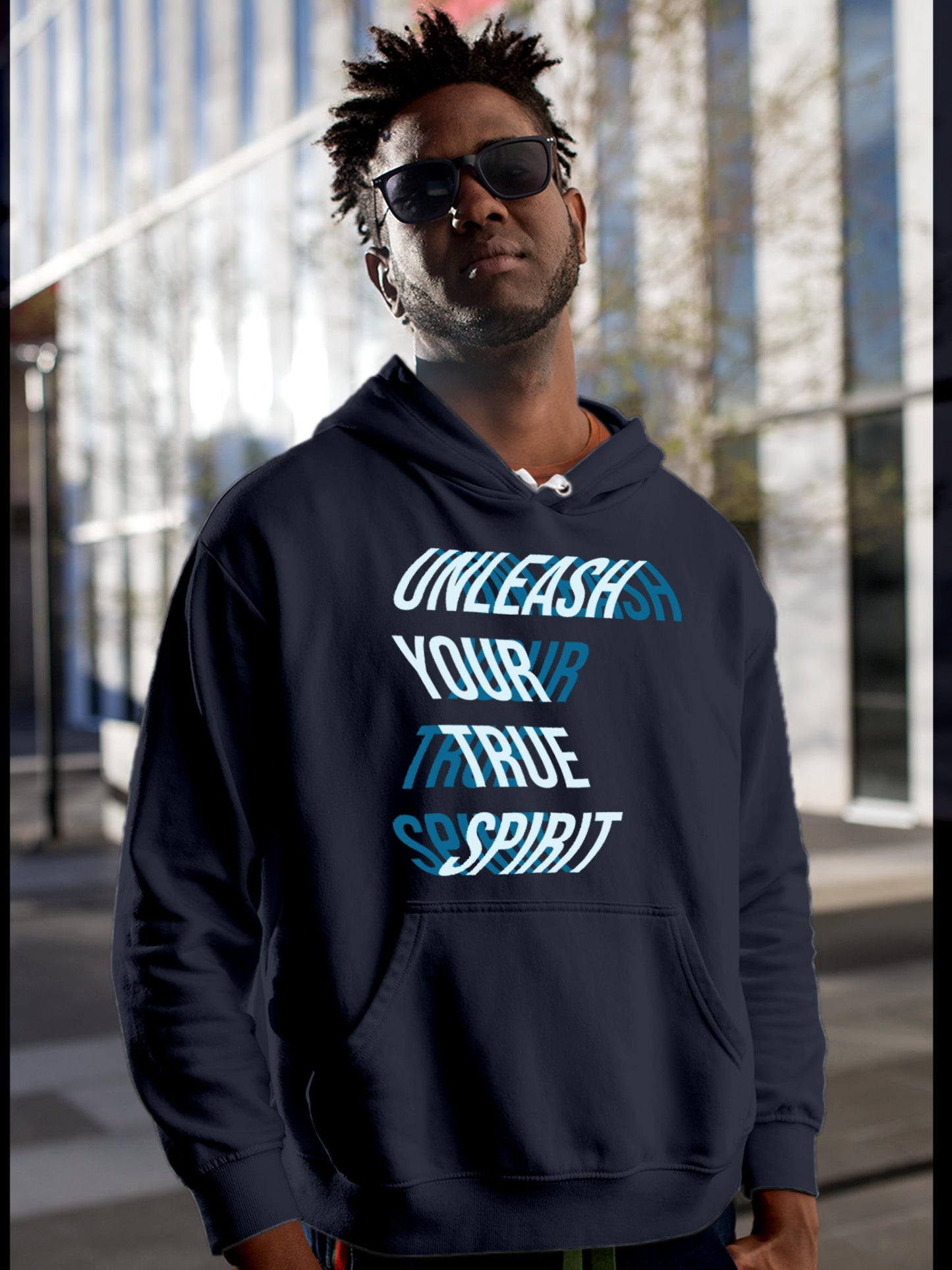 Model wearing Men's Navy Blue Hoodie Sweatshirt with 'Unleash Your True Spirit' design, offering effortless style and premium comfort