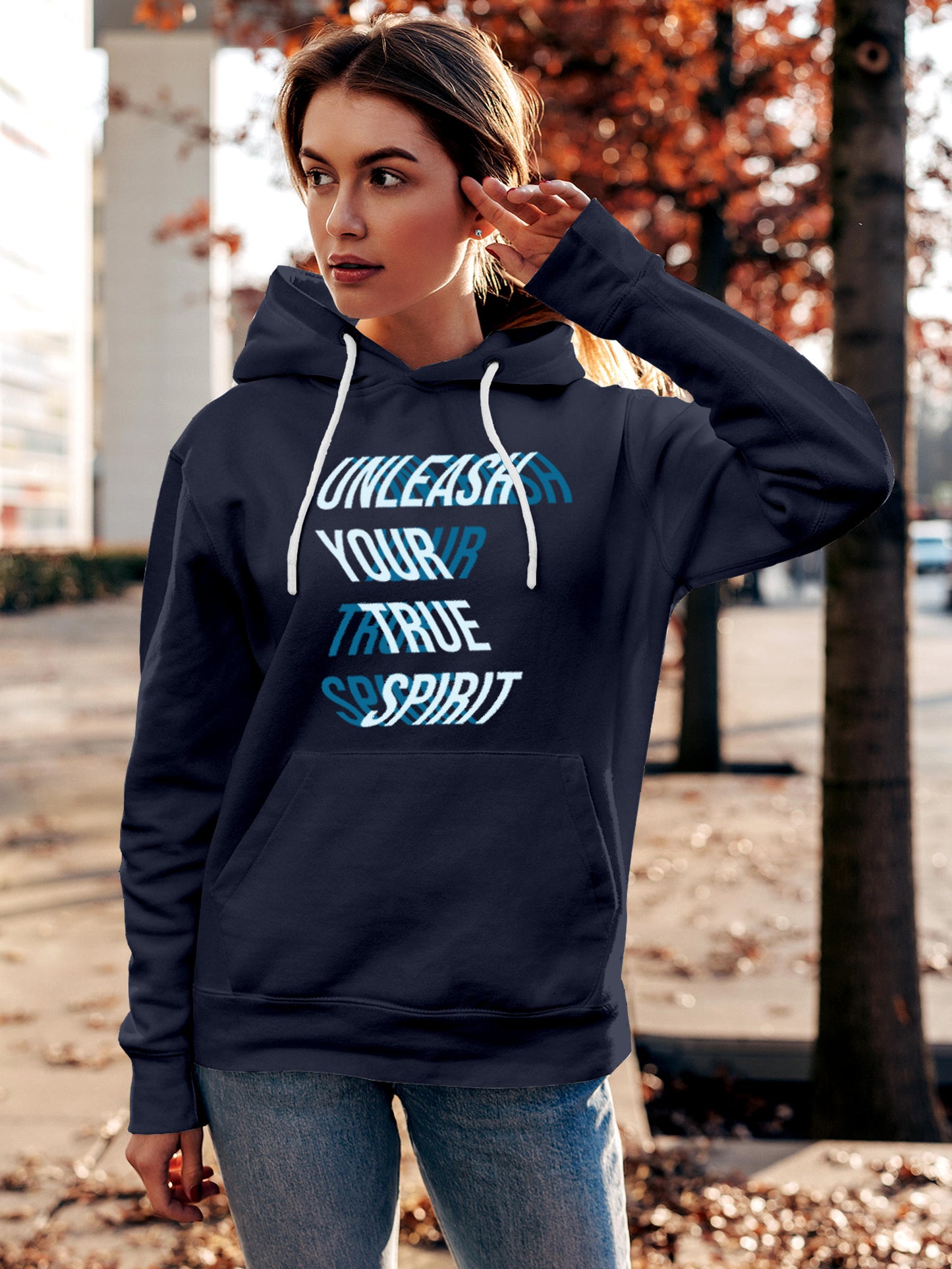 Model wearing Women's Navy Blue Hoodie Sweatshirt with 'Unleash Your True Spirit' design, offering effortless style and premium comfort
