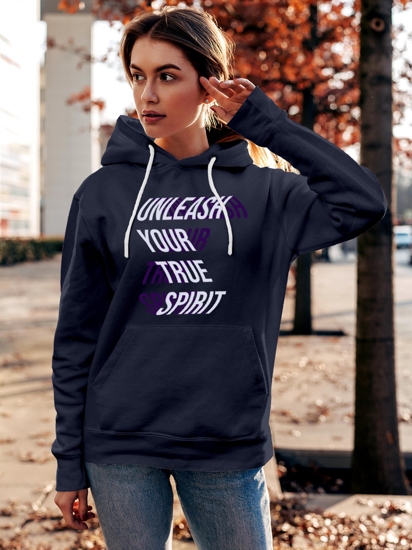 Model wearing Women's Navy Blue Hoodie Sweatshirt with 'Unleash Your True Spirit' design, offering effortless style and premium comfort