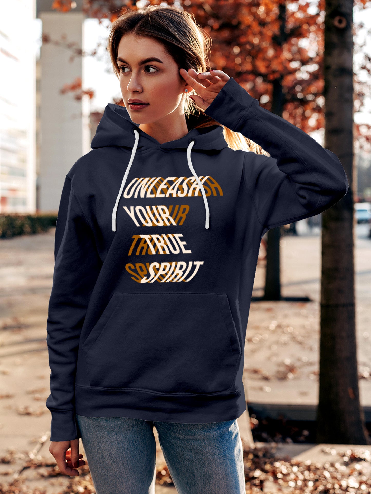 Model wearing Women's Navy Blue Hoodie Sweatshirt with 'Unleash Your True Spirit' design, offering effortless style and premium comfort