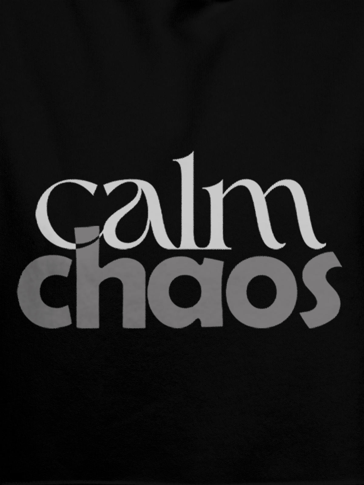 Close up of 'Calm Chaos' design on Women's Black Hoodie Sweatshirt, highlighting intricate details and vibrant print.