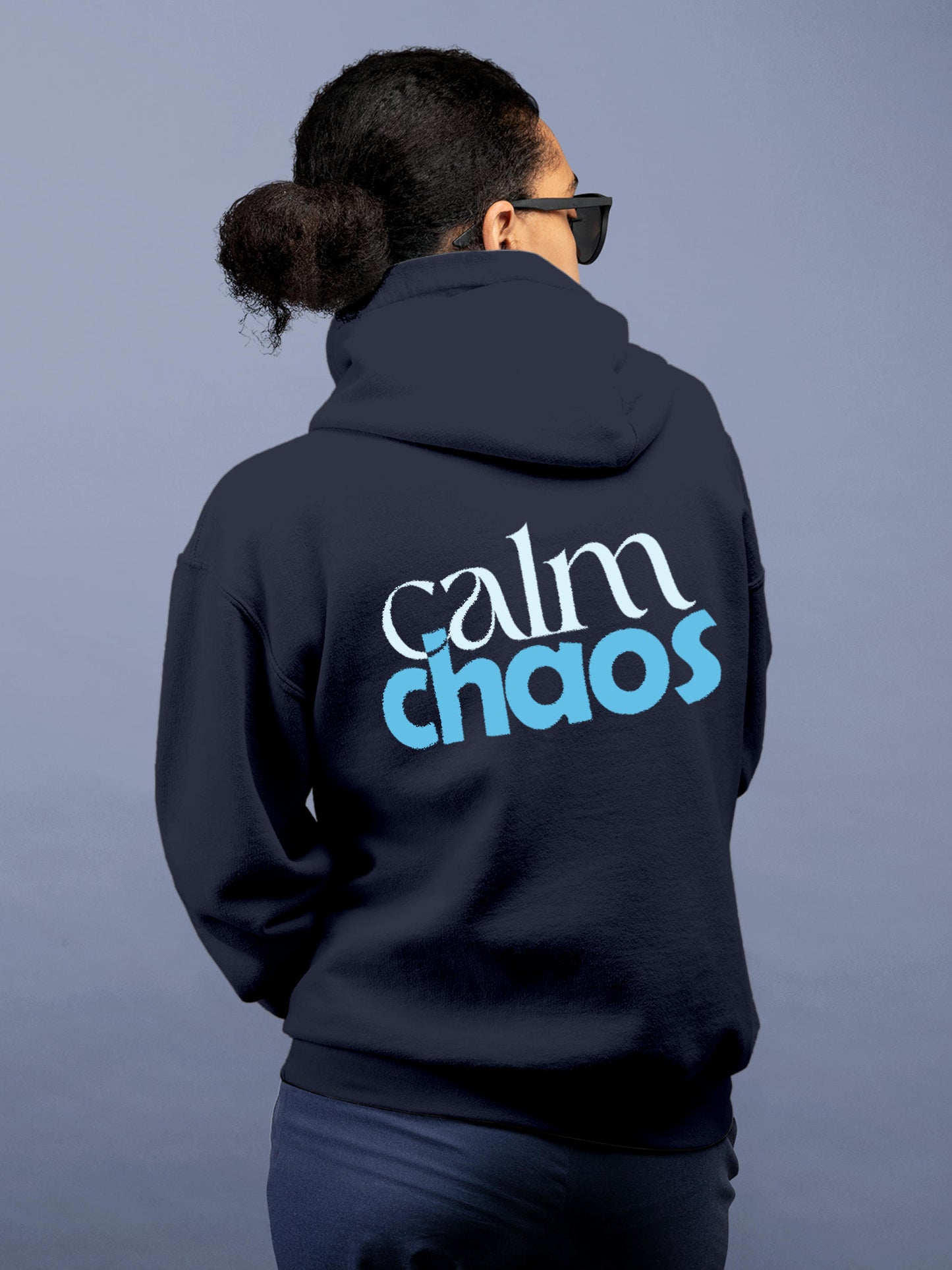 Model wearing Women's Navy Blue Hoodie Sweatshirt with 'Calm Chaos' design, offering effortless style and premium comfort