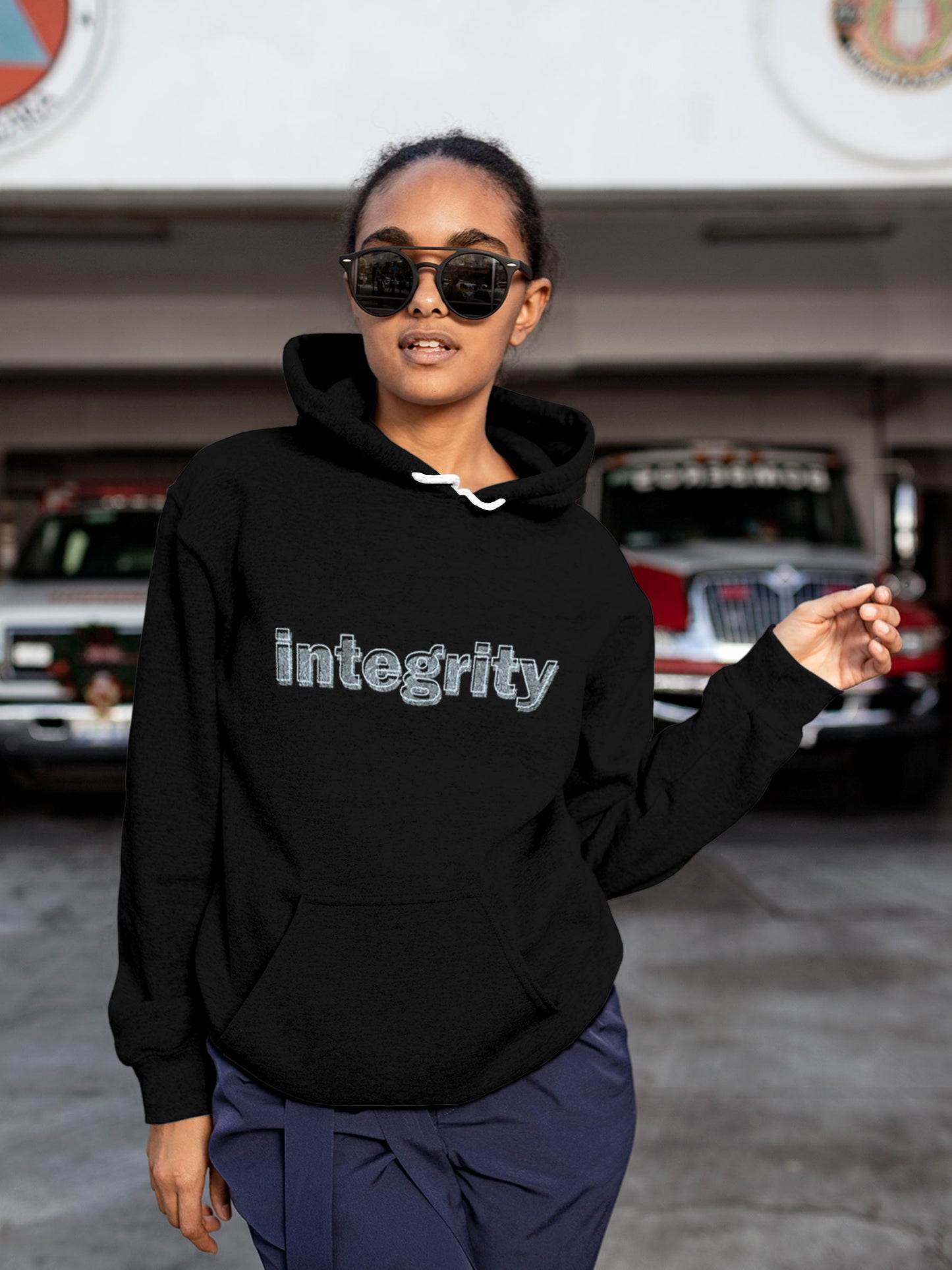 Model wearing Women's Black Hoodie Sweatshirt with 'Integrity' design, offering effortless style and premium comfort