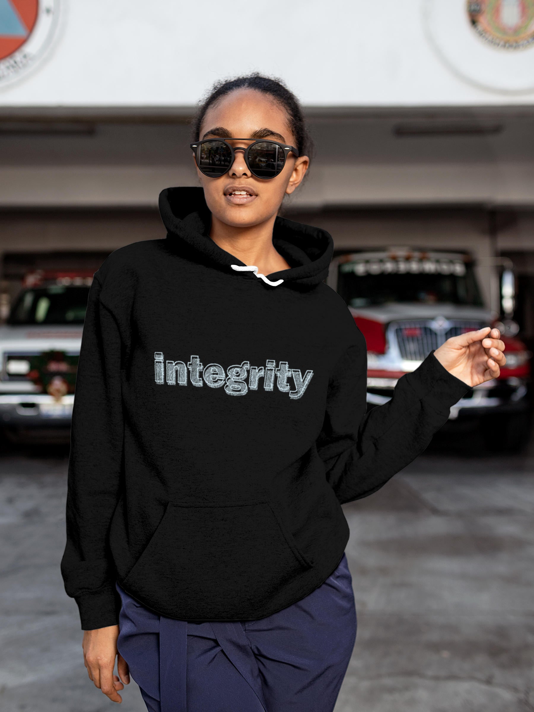 Model wearing Women's Black Hoodie Sweatshirt with 'Integrity' design, offering effortless style and premium comfort