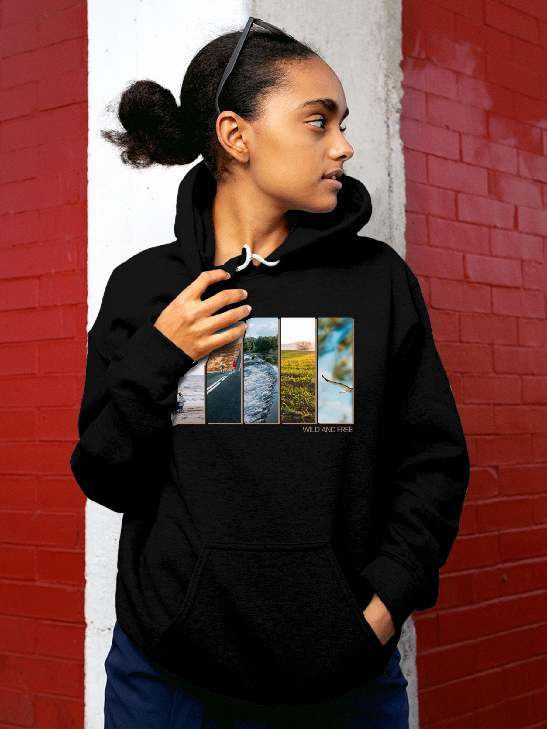 Model wearing Women's Black Hoodie Sweatshirt with 'Wild & Free' design, offering effortless style and premium comfort