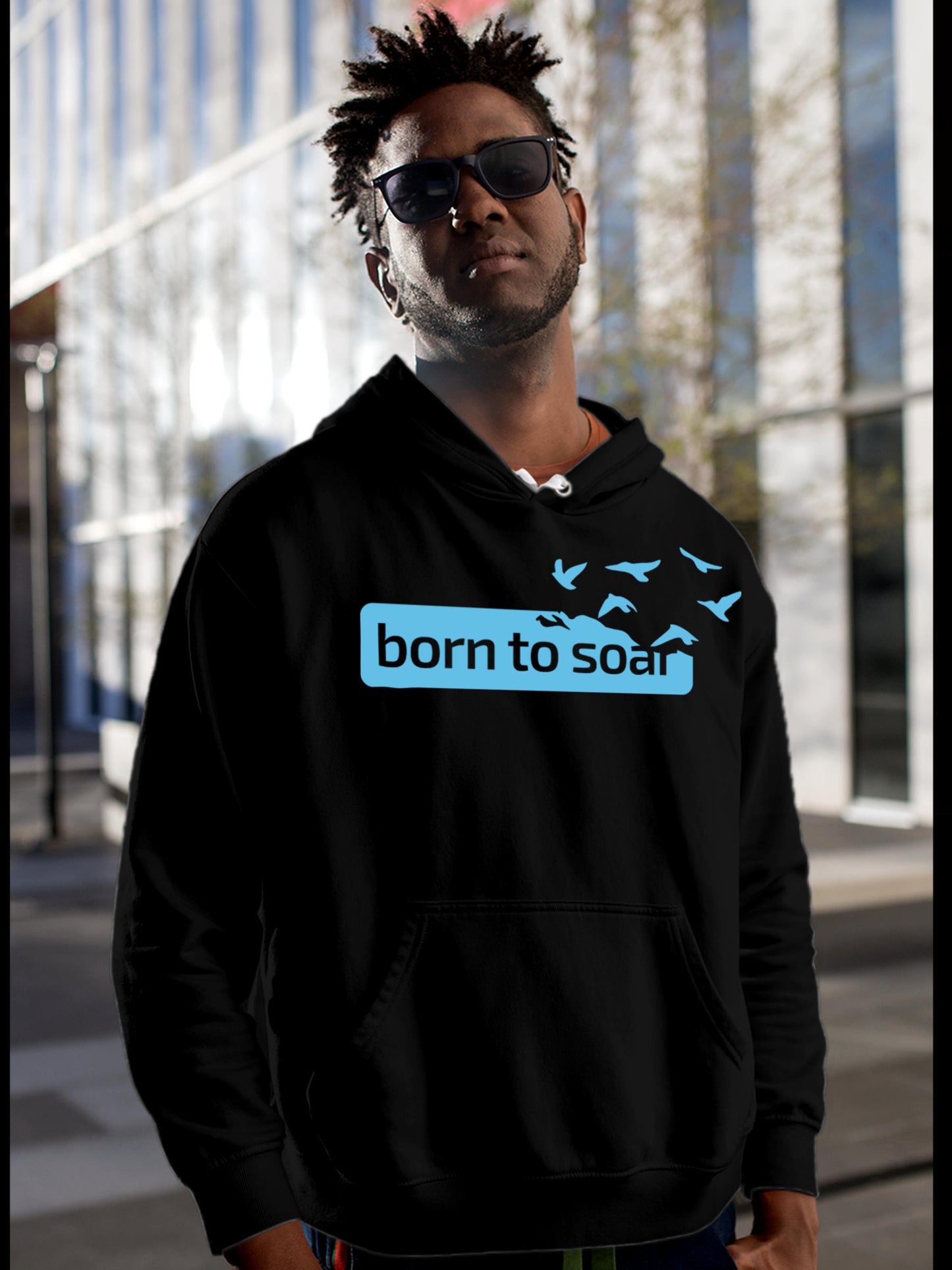 Model wearing Men's Black Hoodie Sweatshirt with 'Born To Soar' design, offering effortless style and premium comfort