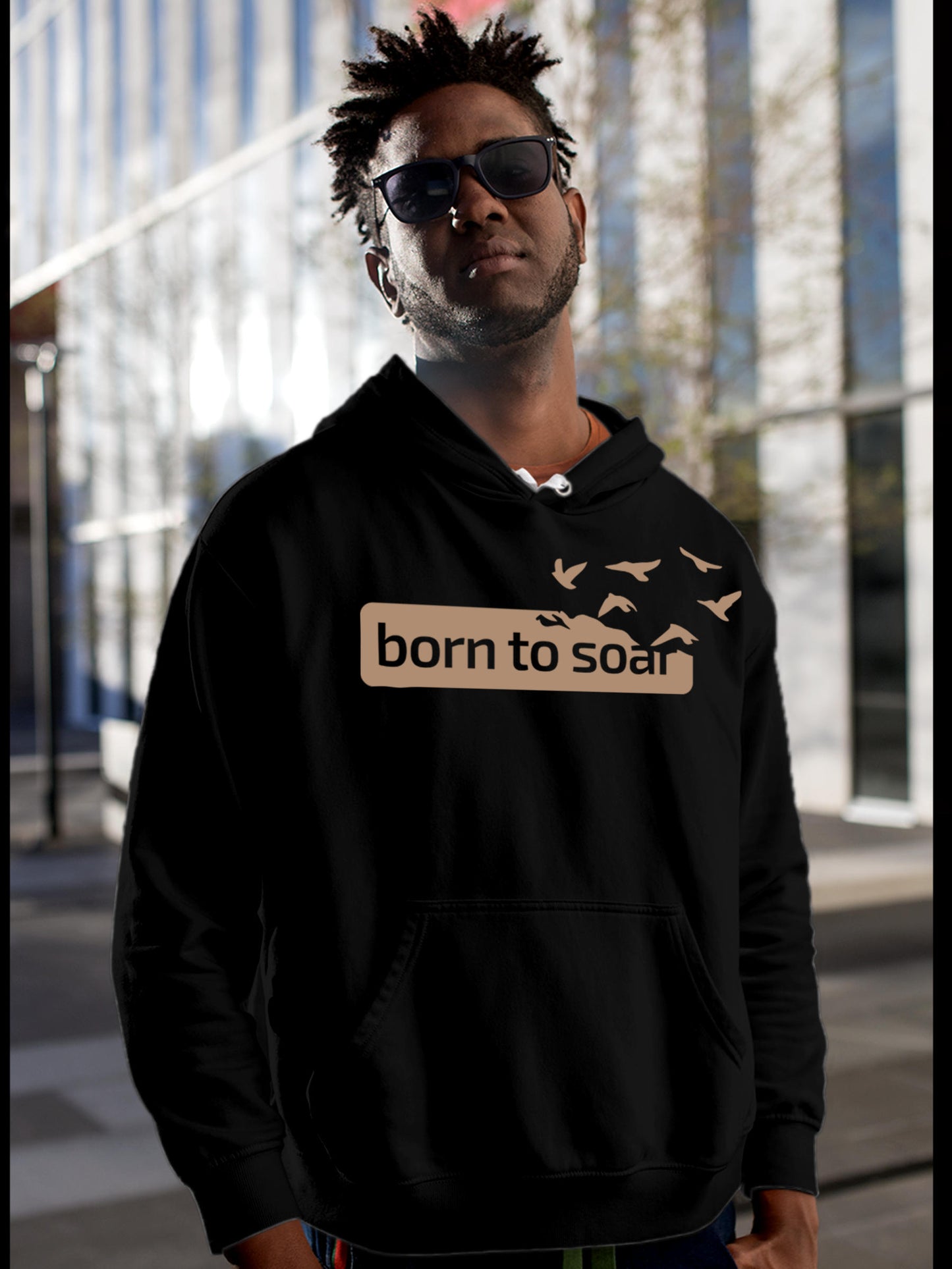 Model wearing Men's Black Hoodie Sweatshirt with 'Born To Soar' design, offering effortless style and premium comfort