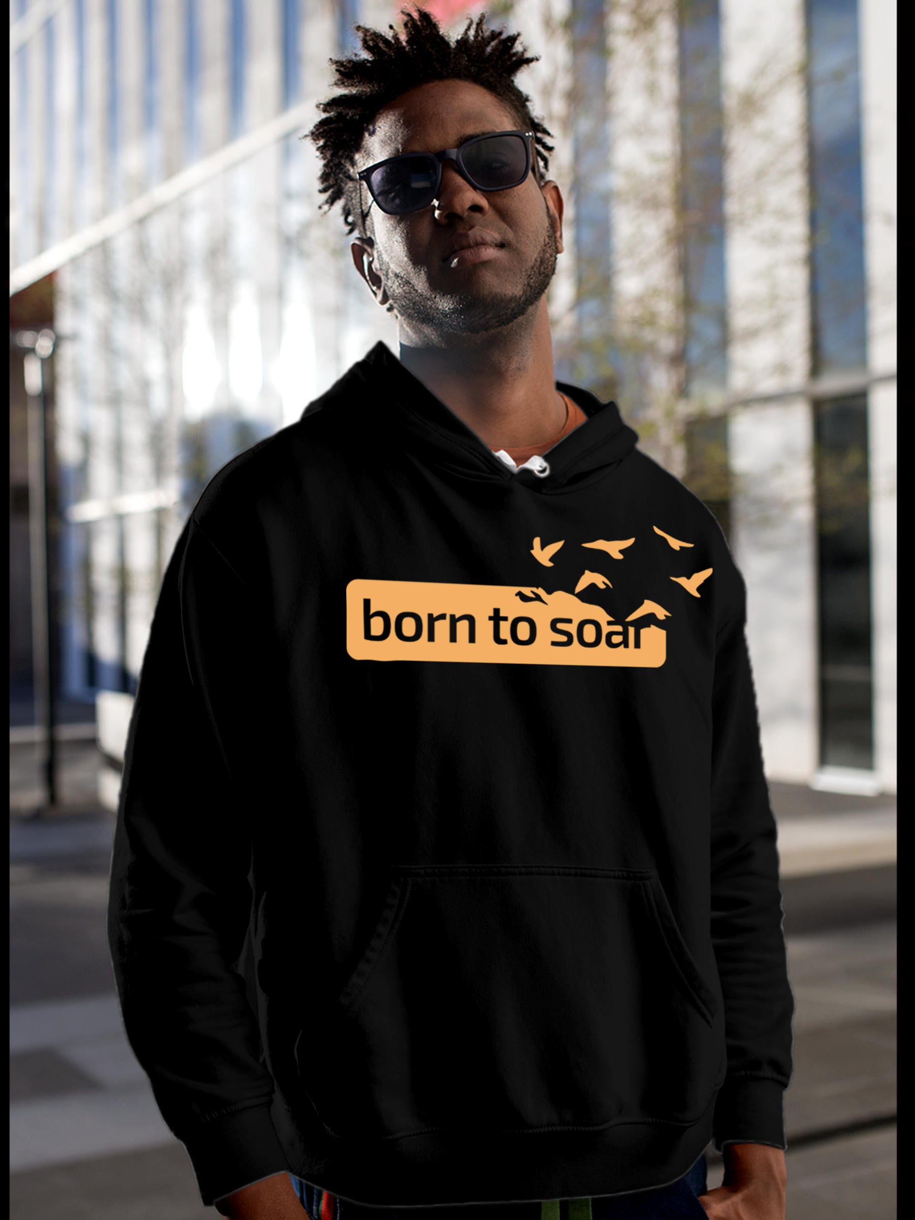 Model wearing Men's Black Hoodie Sweatshirt with 'Born To Soar' design, offering effortless style and premium comfort