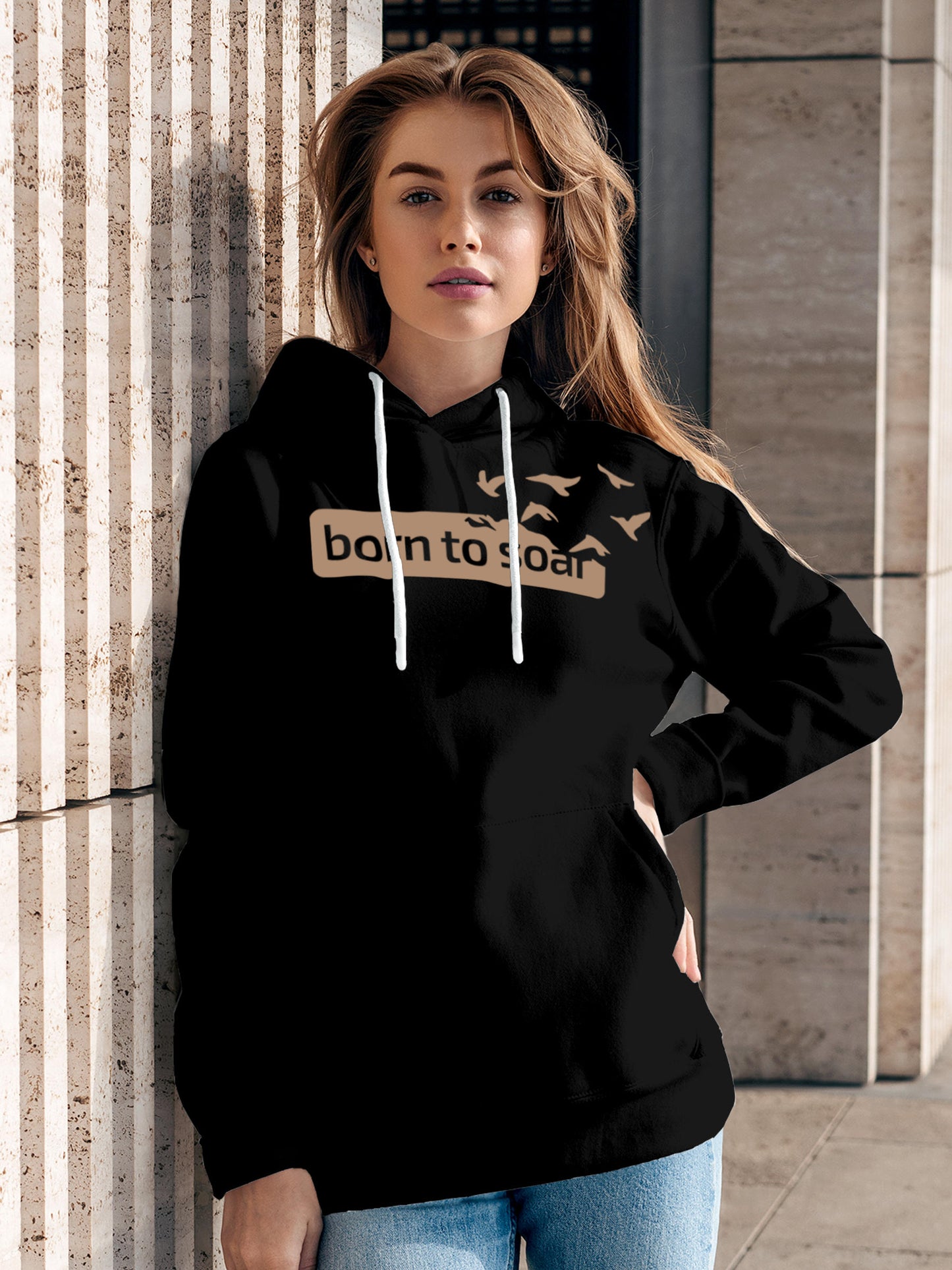 Model wearing Women's Black Hoodie Sweatshirt with 'Born To Soar' design, offering effortless style and premium comfort