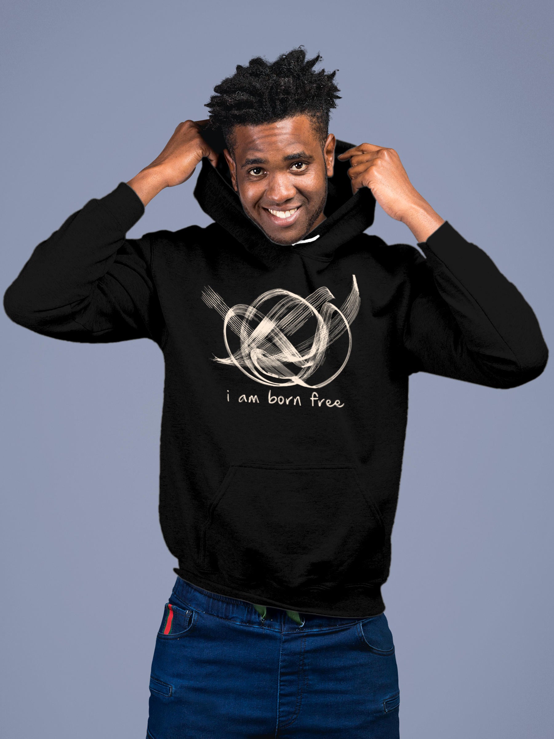 Model wearing Men's Black Hoodie Sweatshirt with 'Born Free' design, offering effortless style and premium comfort
