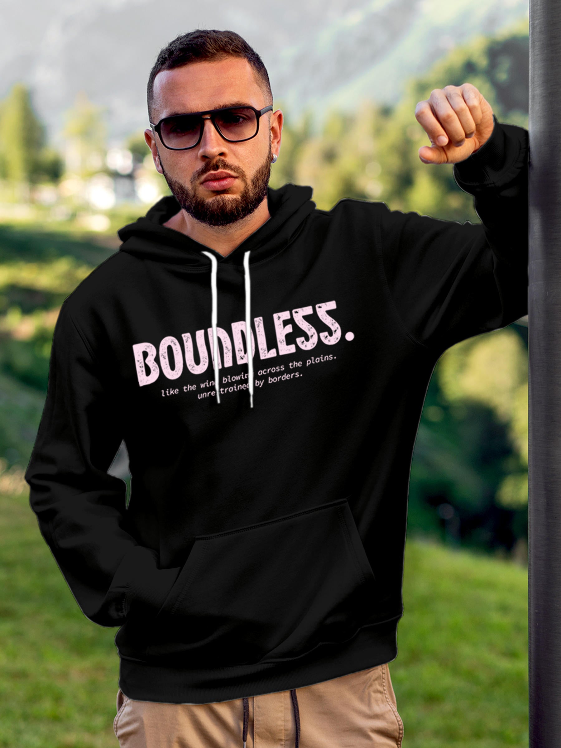 Model wearing Men's Black Hoodie Sweatshirt with 'Boundless' design, offering effortless style and premium comfort