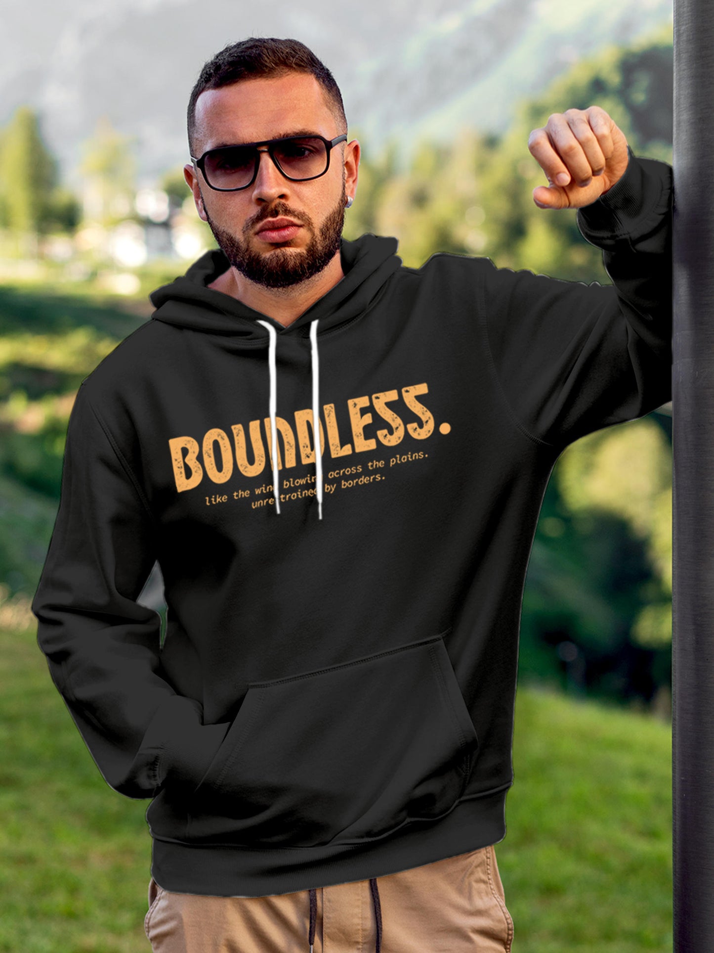 Model wearing Men's Dark Grey Hoodie Sweatshirt with 'Boundless' design, offering effortless style and premium comfort