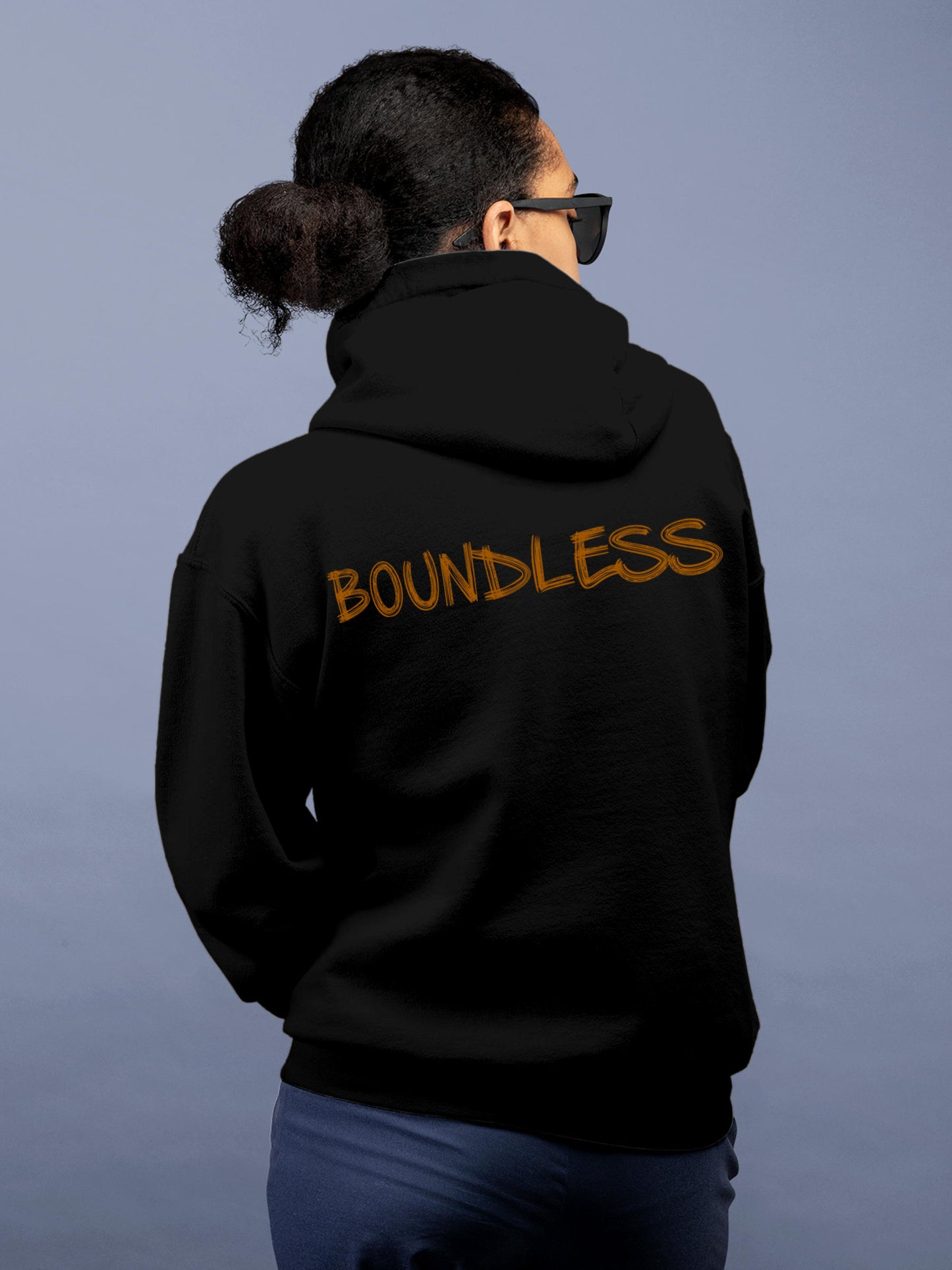 Model wearing Women's Black Hoodie Sweatshirt with 'Boundless' design, offering effortless style and premium comfort