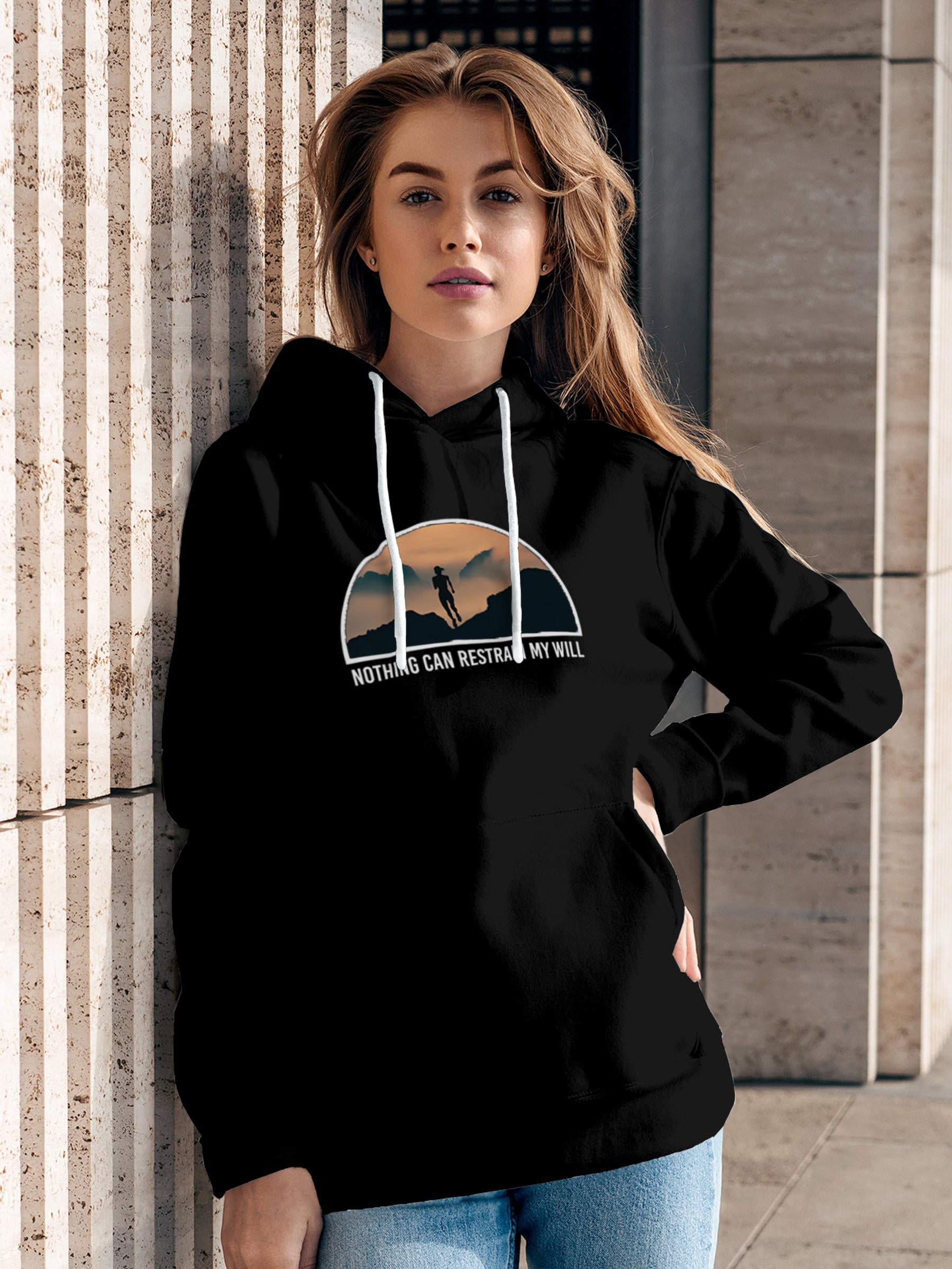 Model wearing Women's Black Hoodie Sweatshirt with 'Limitless Will' design, offering effortless style and premium comfort