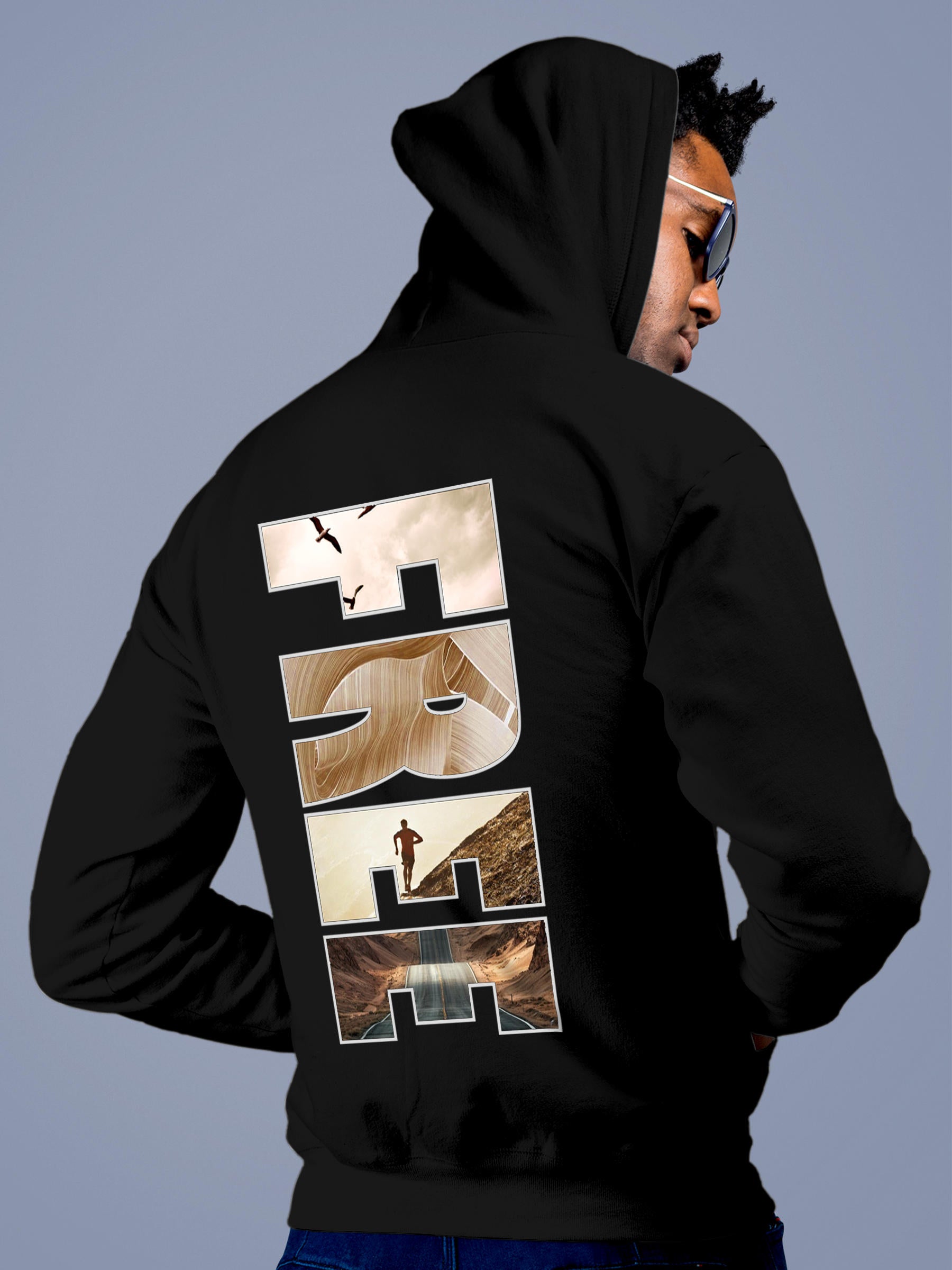Model wearing Men's Black Hoodie Sweatshirt with 'Free & Boundless' design, offering effortless style and premium comfort
