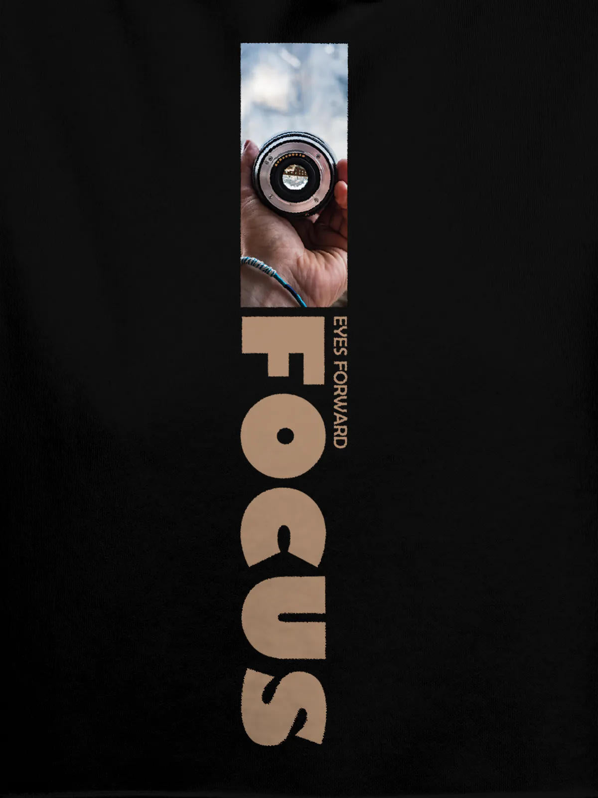 Close up of 'Focus' design on Women's Black Hoodie Sweatshirt, highlighting intricate details and vibrant print.
