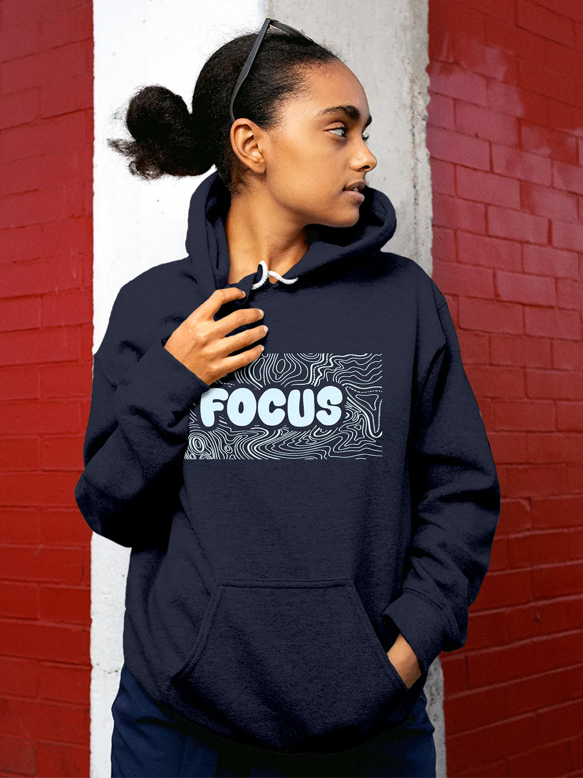 Model wearing Women's Navy Blue Hoodie Sweatshirt with 'Focus In Chaos' design, offering effortless style and premium comfort