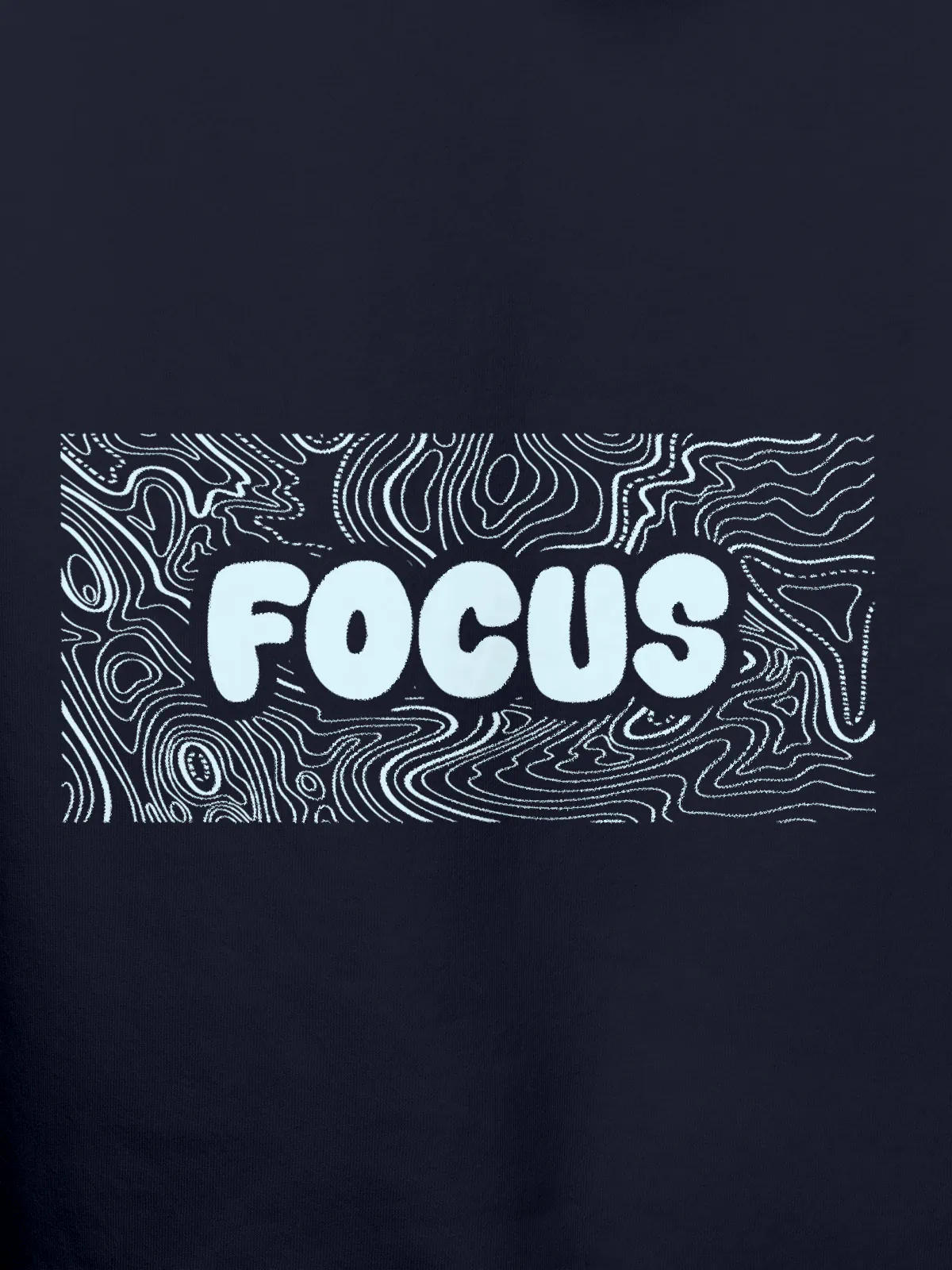 Close up of 'Focus In Chaos' design on Women's Navy Blue Hoodie Sweatshirt, highlighting intricate details and vibrant print.