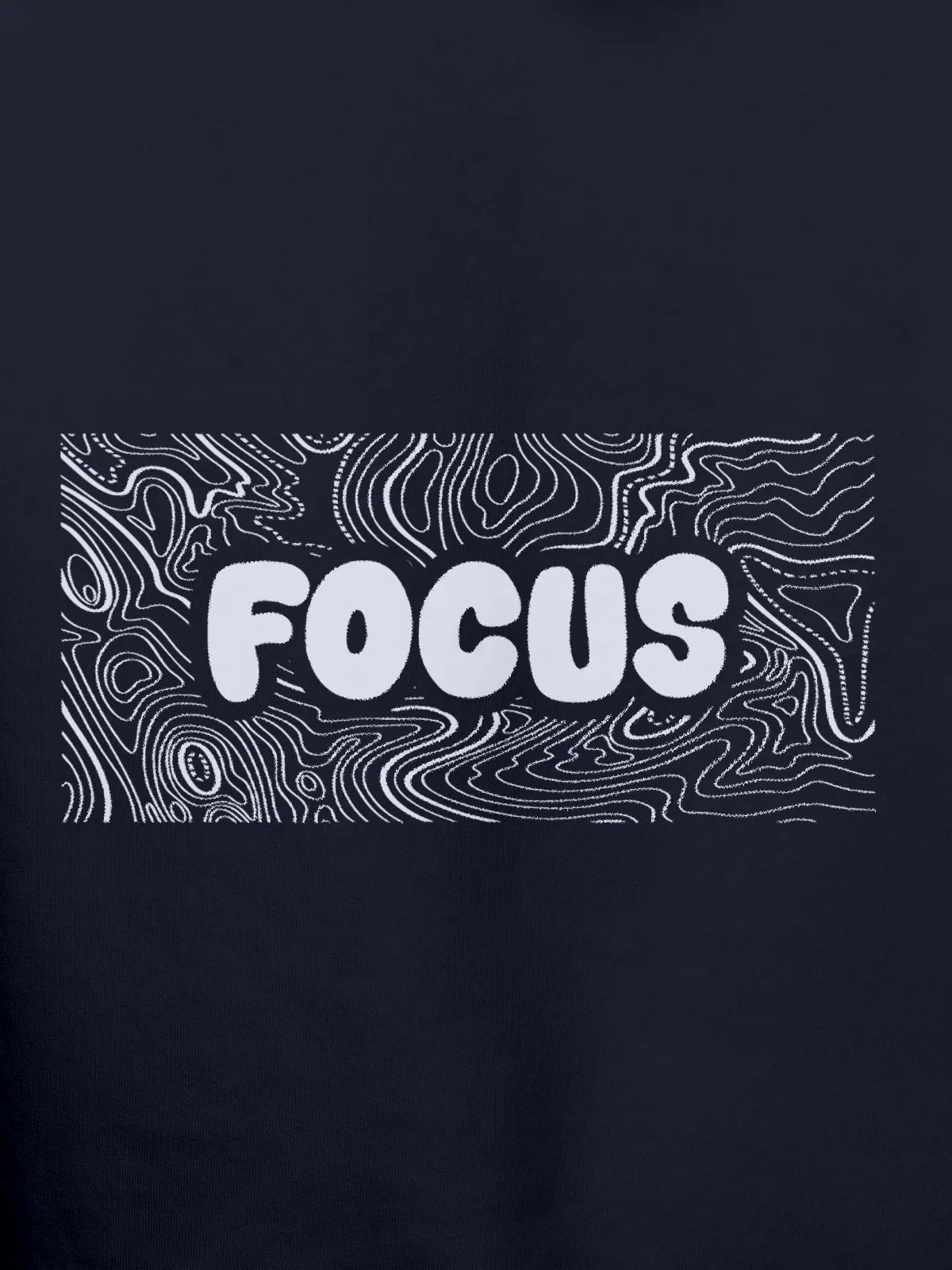 Close up of 'Focus In Chaos' design on Women's Navy Blue Hoodie Sweatshirt, highlighting intricate details and vibrant print.