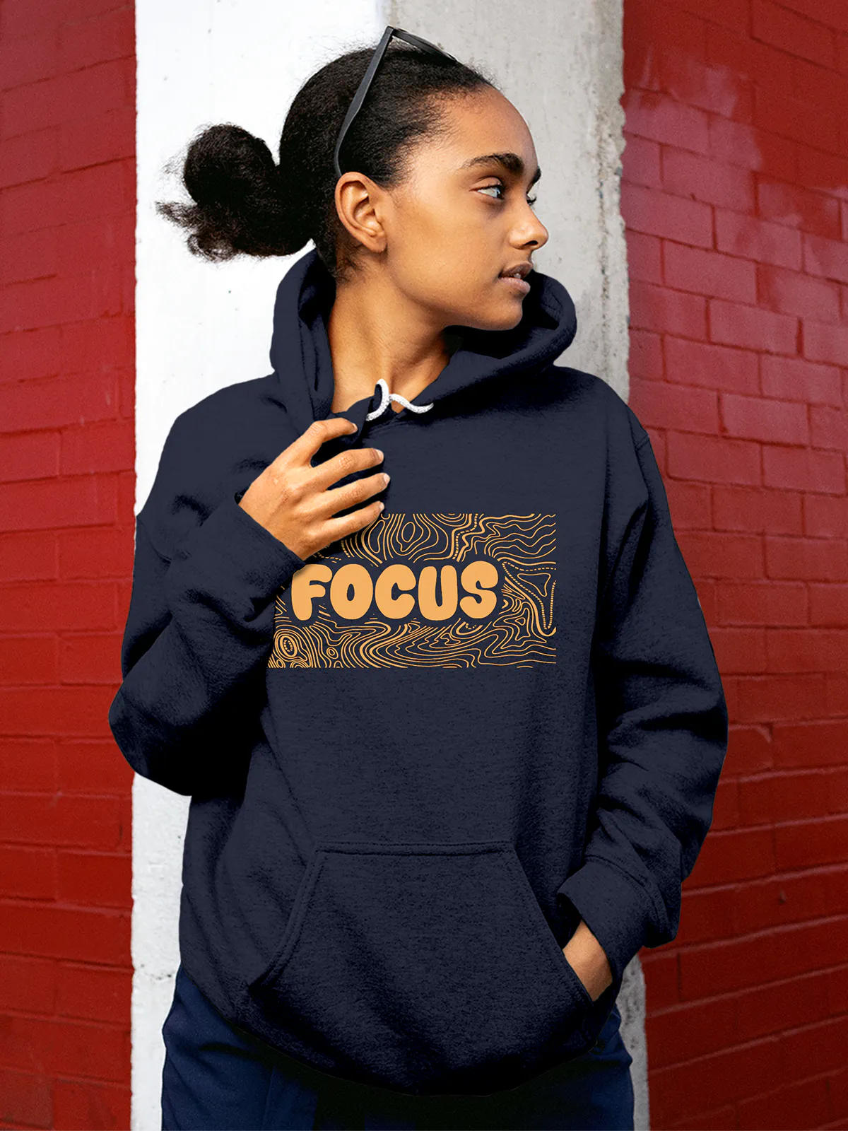 Model wearing Women's Navy Blue Hoodie Sweatshirt with 'Focus In Chaos' design, offering effortless style and premium comfort