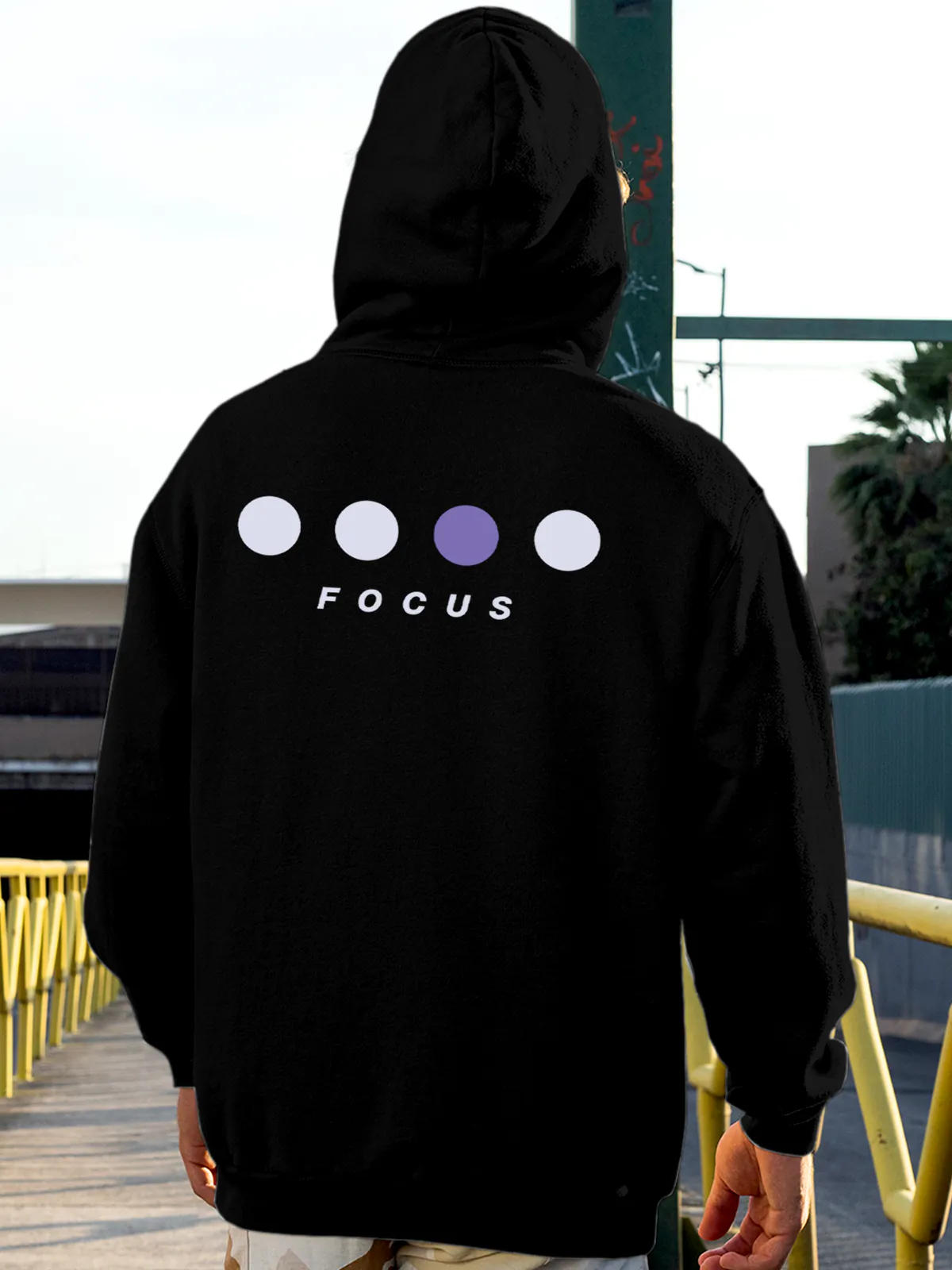 Model wearing Men's Black Hoodie Sweatshirt with 'Focus On Goal' design, offering effortless style and premium comfort