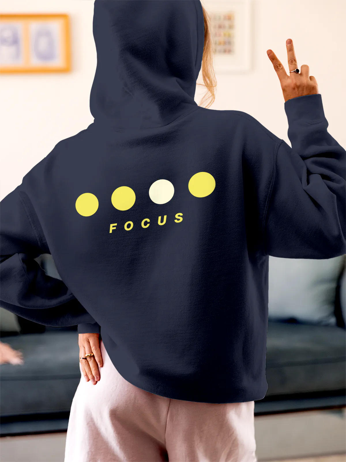 Model wearing Women's Navy Blue Hoodie Sweatshirt with 'Focus On Goal' design, offering effortless style and premium comfort