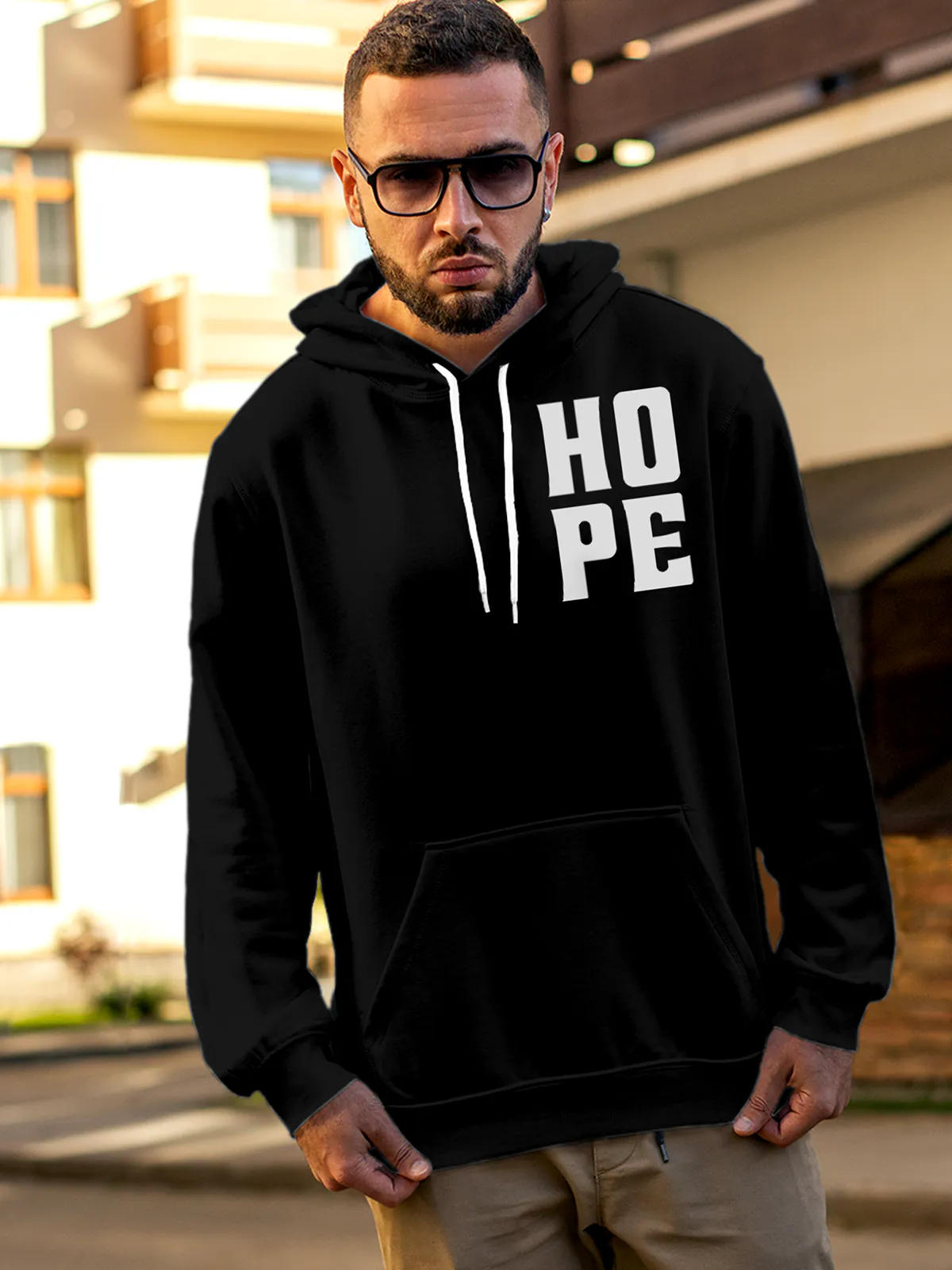 Model wearing Men's Black Hoodie Sweatshirt with 'Hope' design, offering effortless style and premium comfort
