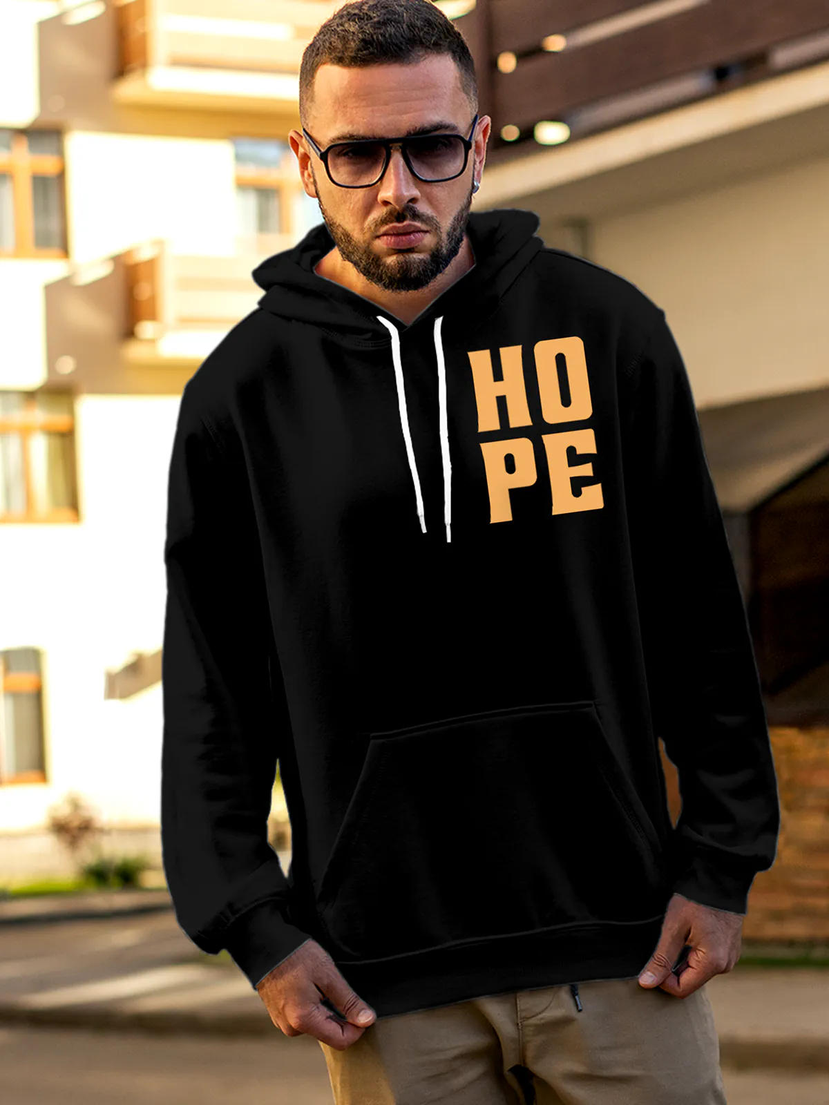 Model wearing Men's Black Hoodie Sweatshirt with 'Hope' design, offering effortless style and premium comfort