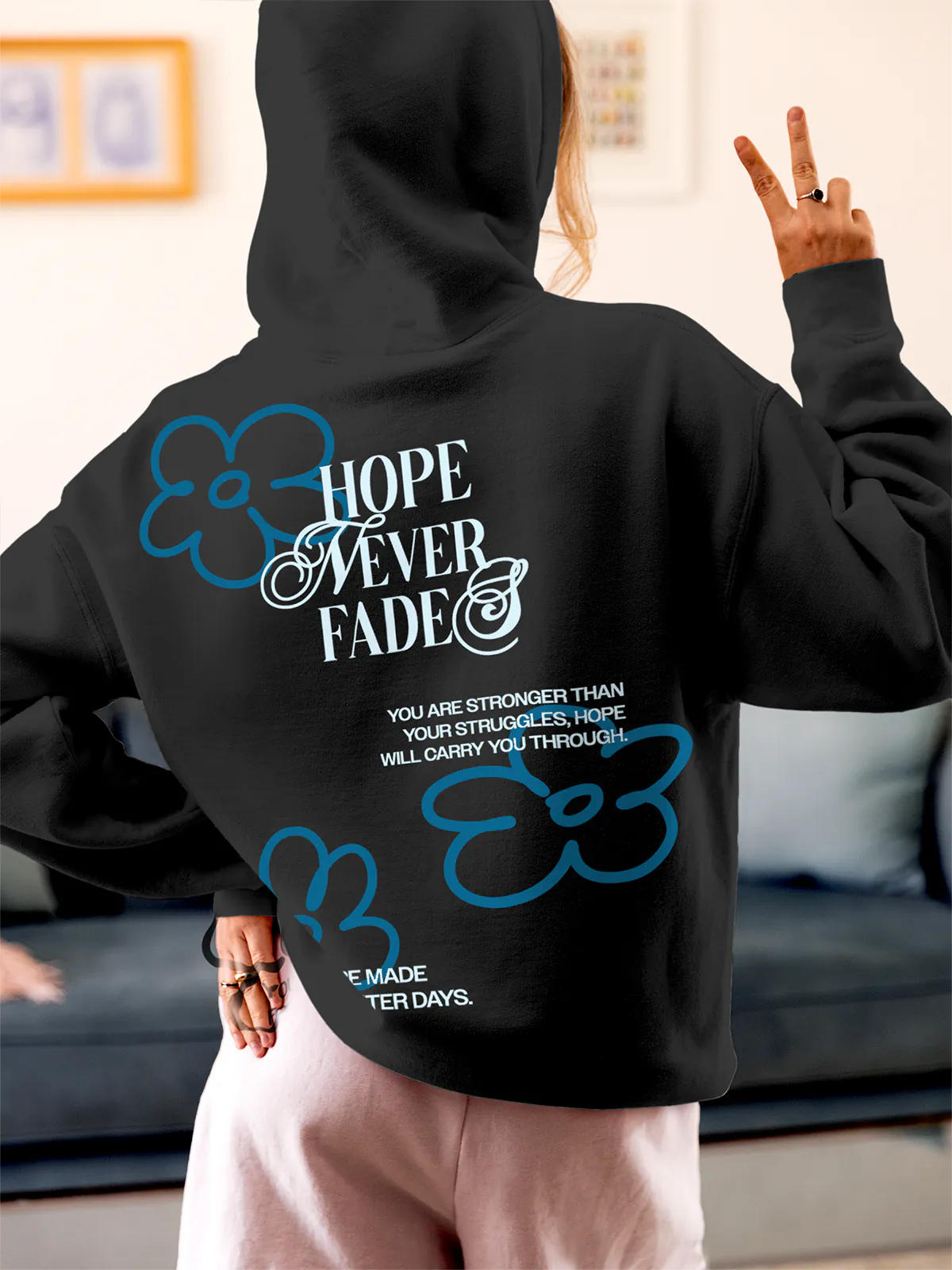 Model wearing Women's Dark Grey Hoodie Sweatshirt with 'Hope Never Fades' design, offering effortless style and premium comfort