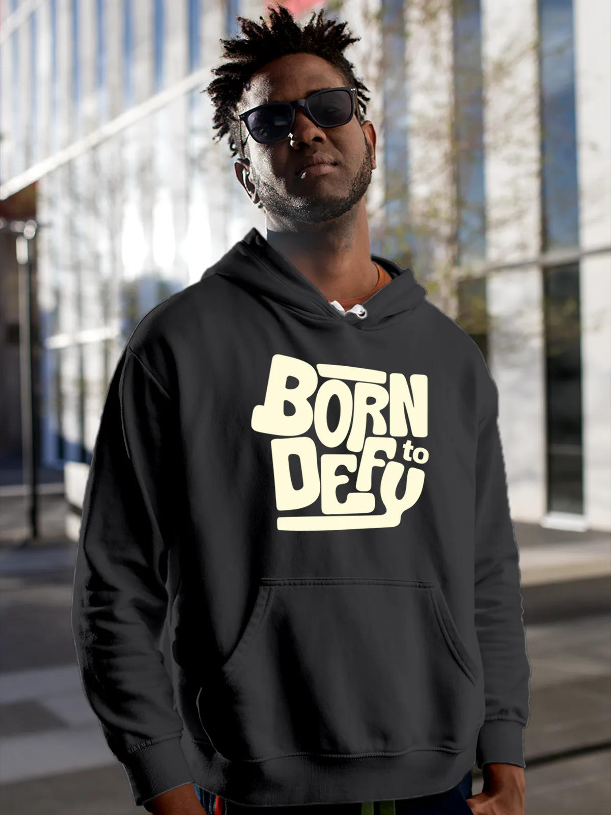 Model wearing Men's Dark Grey Hoodie Sweatshirt with 'Born To Defy' design, offering effortless style and premium comfort