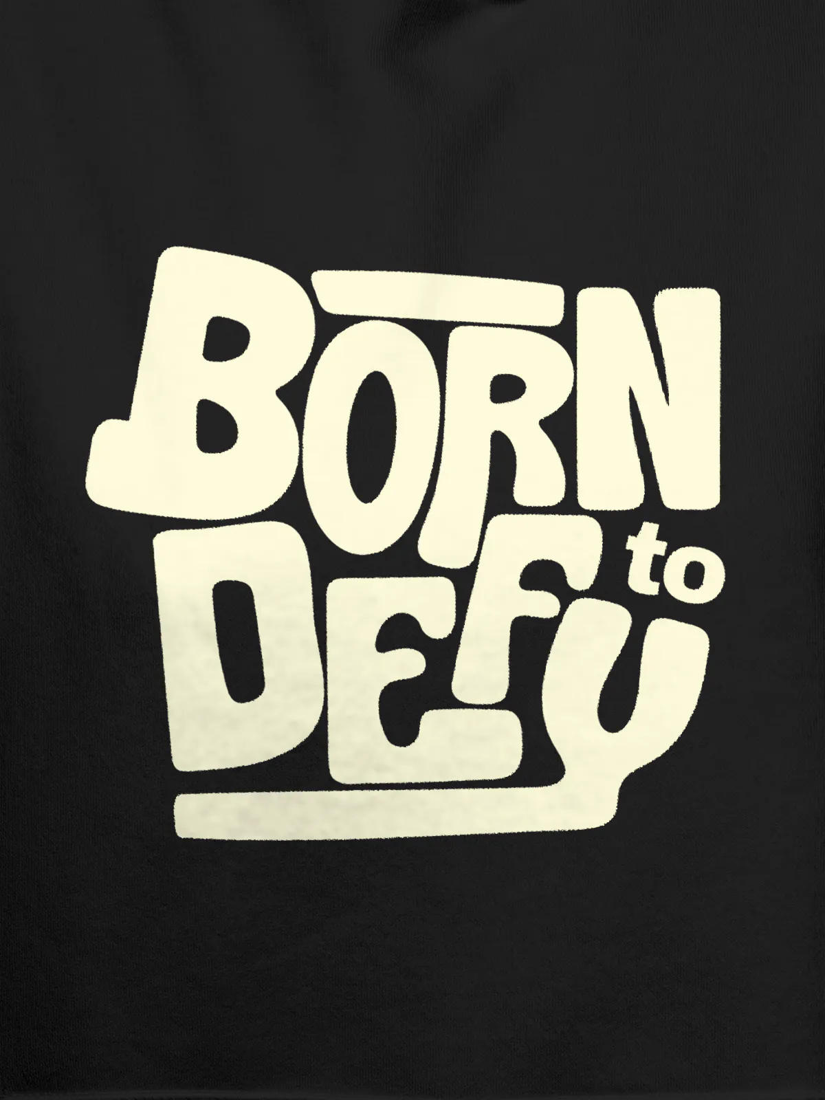 Close up of 'Born To Defy' design on Men's Dark Grey Hoodie Sweatshirt, highlighting intricate details and vibrant print.