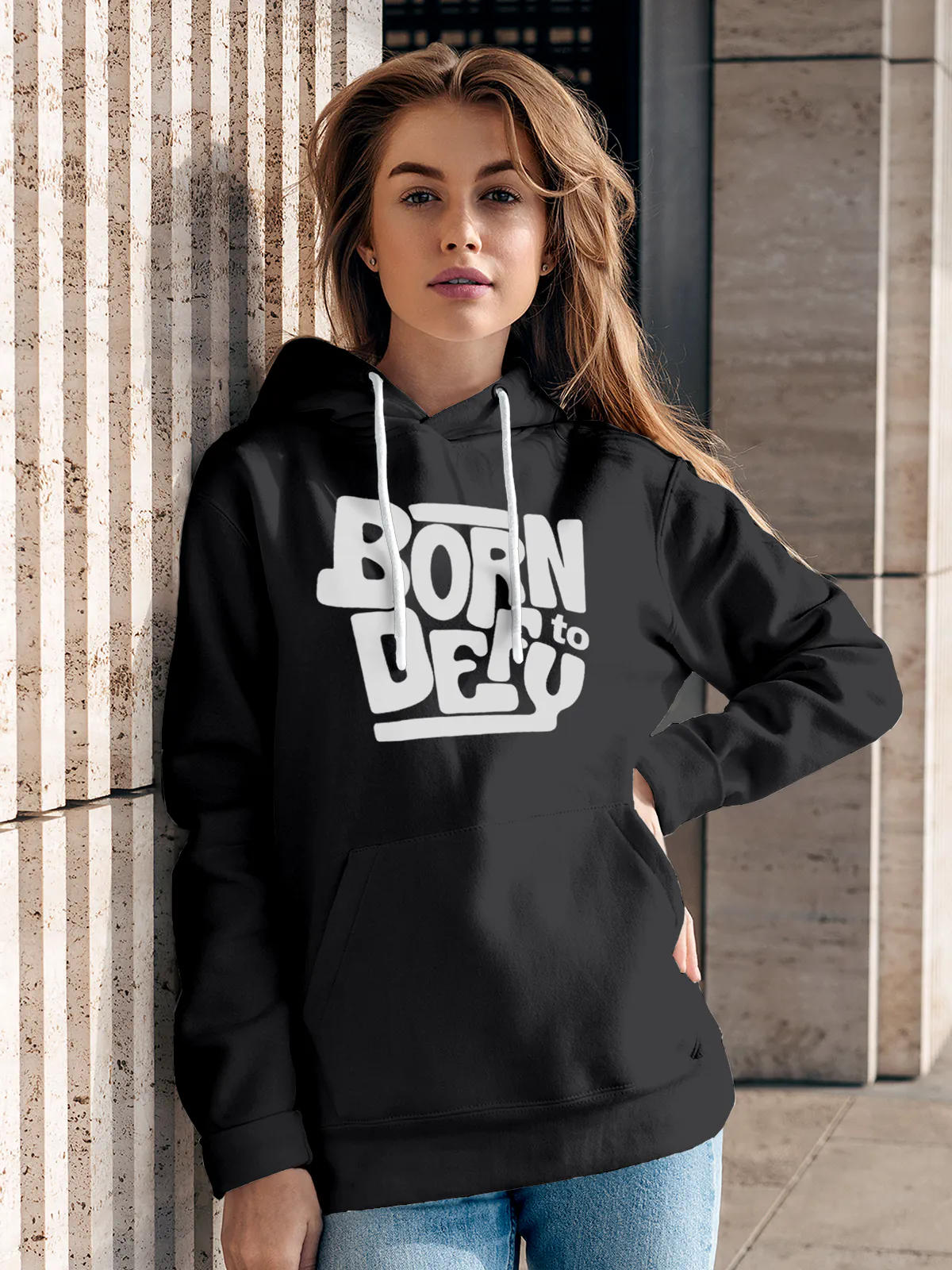Model wearing Women's Dark Grey Hoodie Sweatshirt with 'Born To Defy' design, offering effortless style and premium comfort