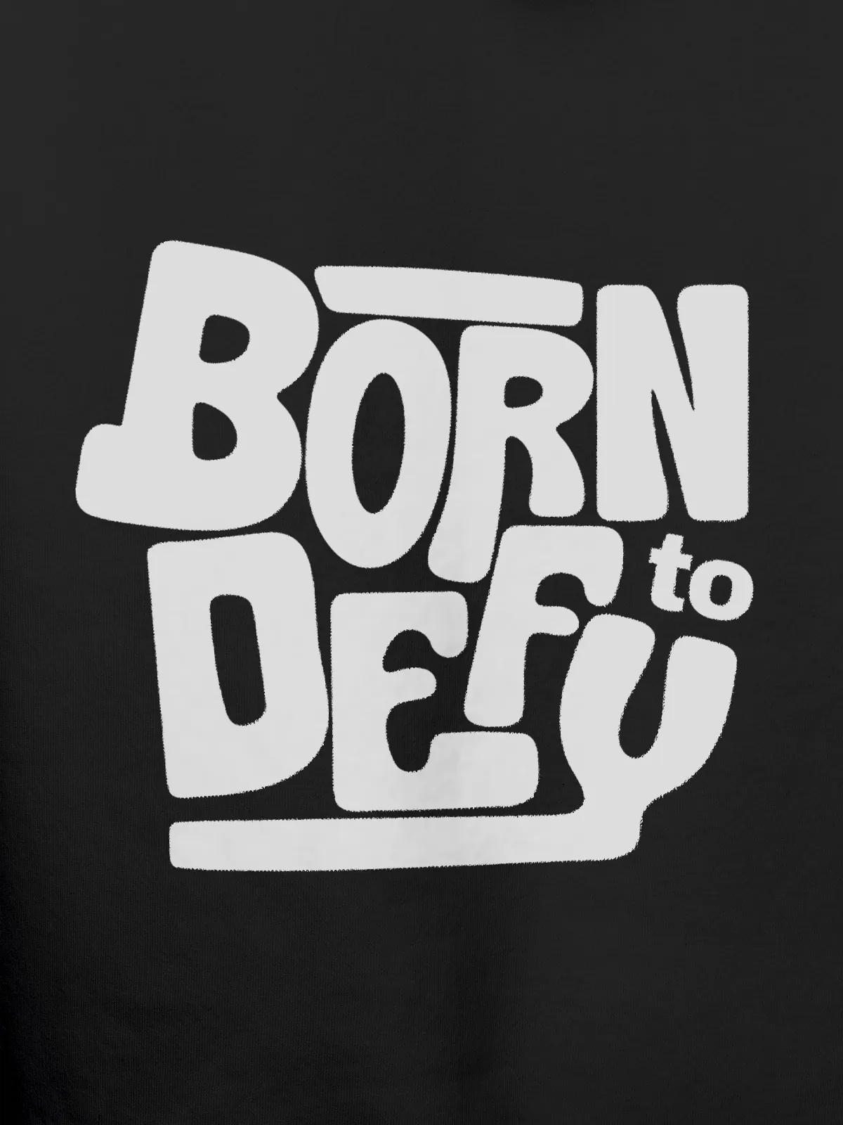 Close up of 'Born To Defy' design on Women's Dark Grey Hoodie Sweatshirt, highlighting intricate details and vibrant print.