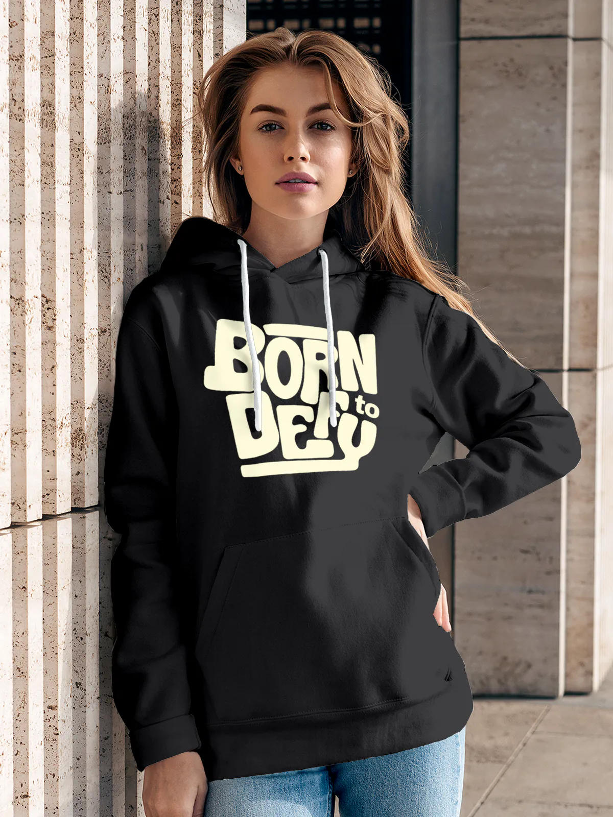 Model wearing Women's Dark Grey Hoodie Sweatshirt with 'Born To Defy' design, offering effortless style and premium comfort