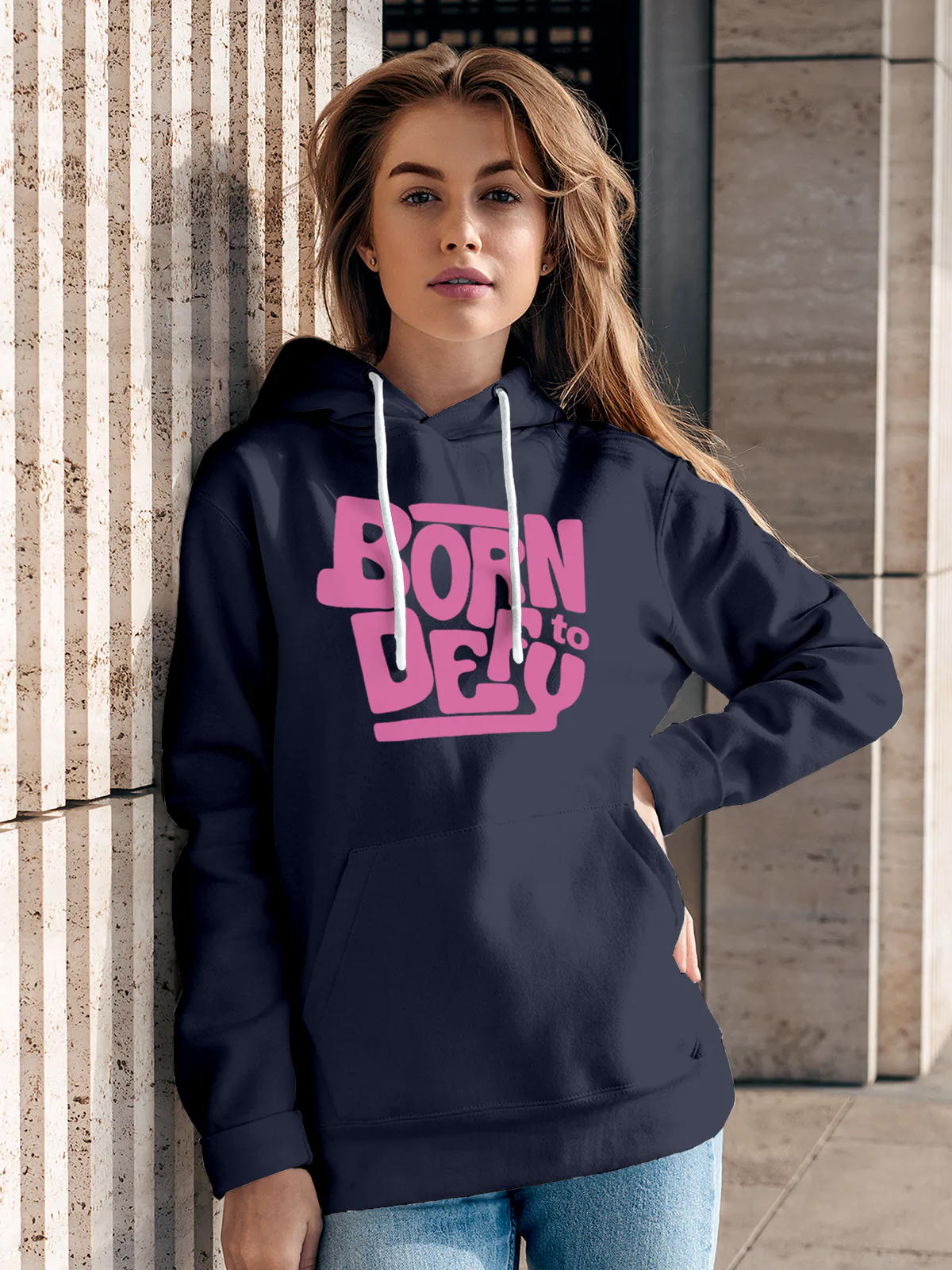 Model wearing Women's Navy Blue Hoodie Sweatshirt with 'Born To Defy' design, offering effortless style and premium comfort
