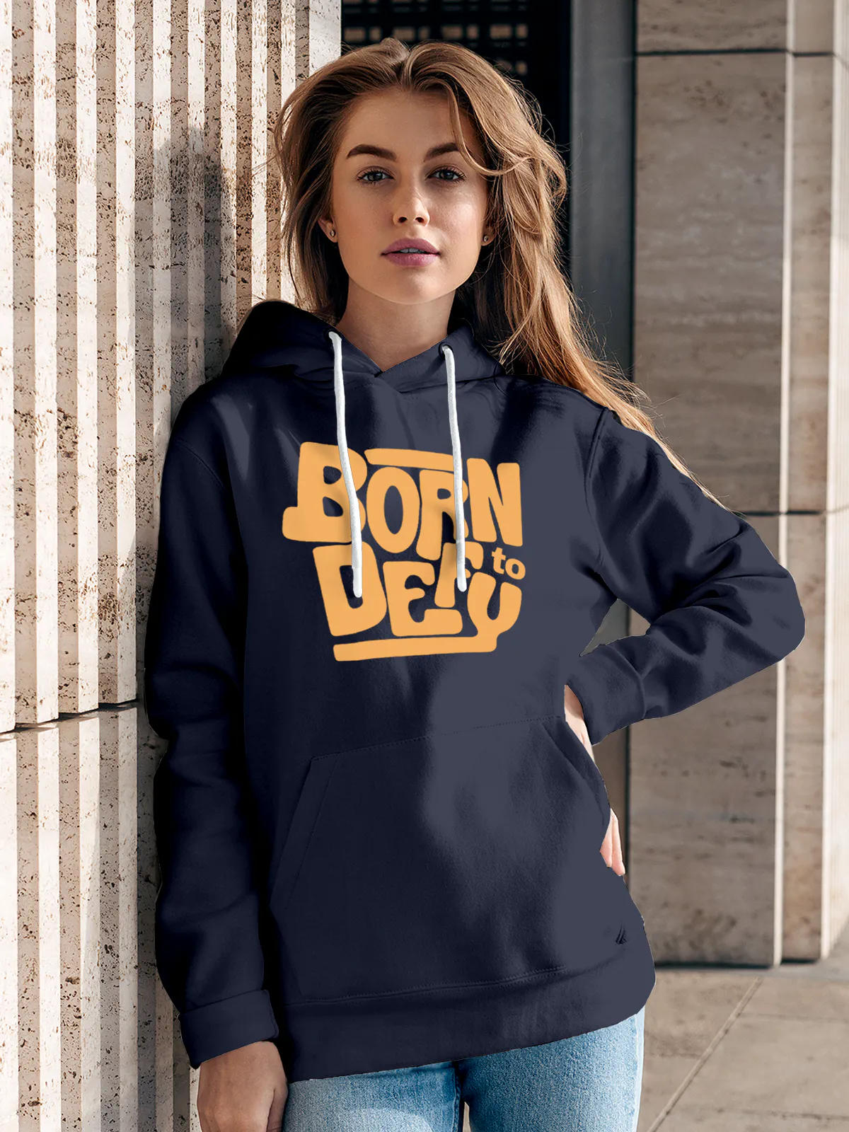 Model wearing Women's Navy Blue Hoodie Sweatshirt with 'Born To Defy' design, offering effortless style and premium comfort