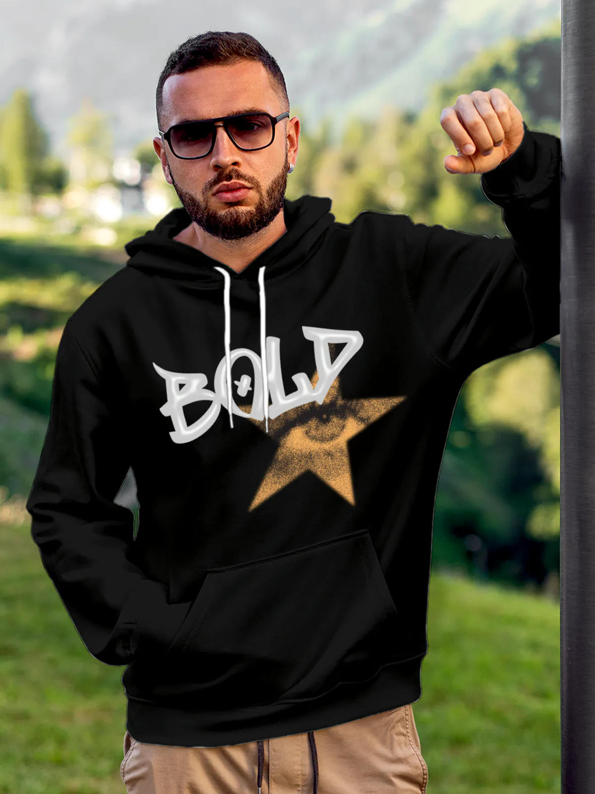 Model wearing Men's Black Hoodie Sweatshirt with 'Bold' design, offering effortless style and premium comfort