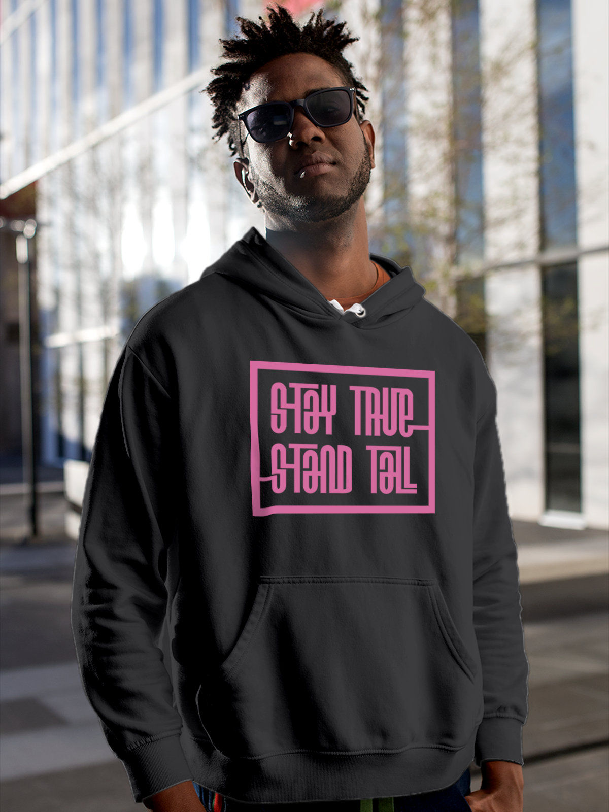 Model wearing Men's Dark Grey Hoodie Sweatshirt with 'Stay True Stand Tall' design, offering effortless style and premium comfort