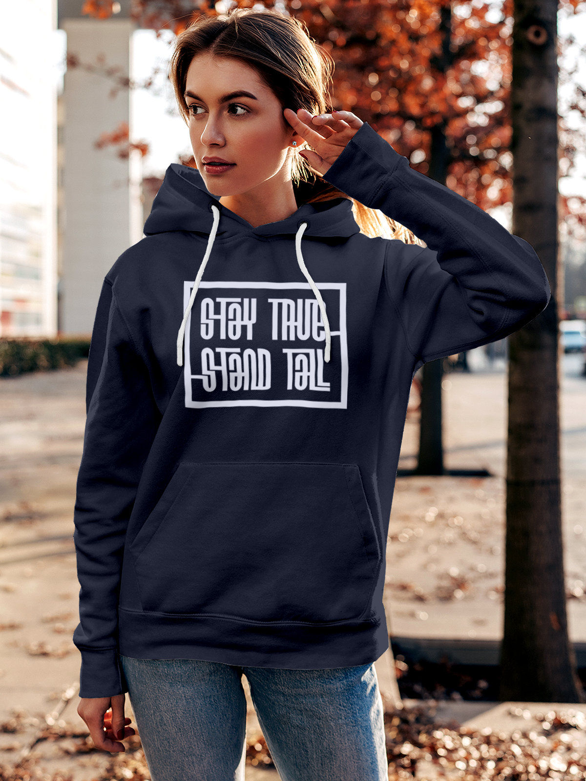 Model wearing Women's Navy Blue Hoodie Sweatshirt with 'Stay True Stand Tall' design, offering effortless style and premium comfort