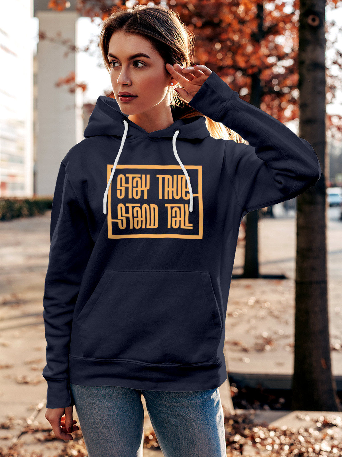 Model wearing Women's Navy Blue Hoodie Sweatshirt with 'Stay True Stand Tall' design, offering effortless style and premium comfort