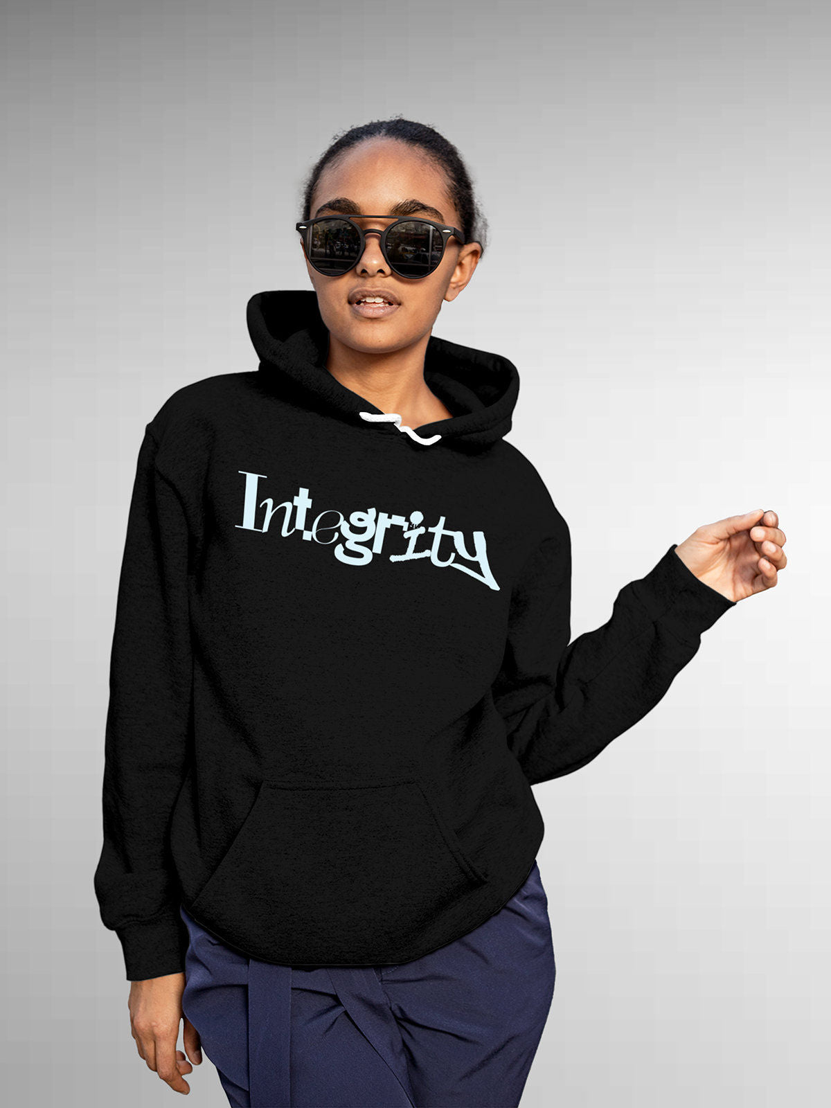 Model wearing Women's Black Hoodie Sweatshirt with 'Integrity' design, offering effortless style and premium comfort