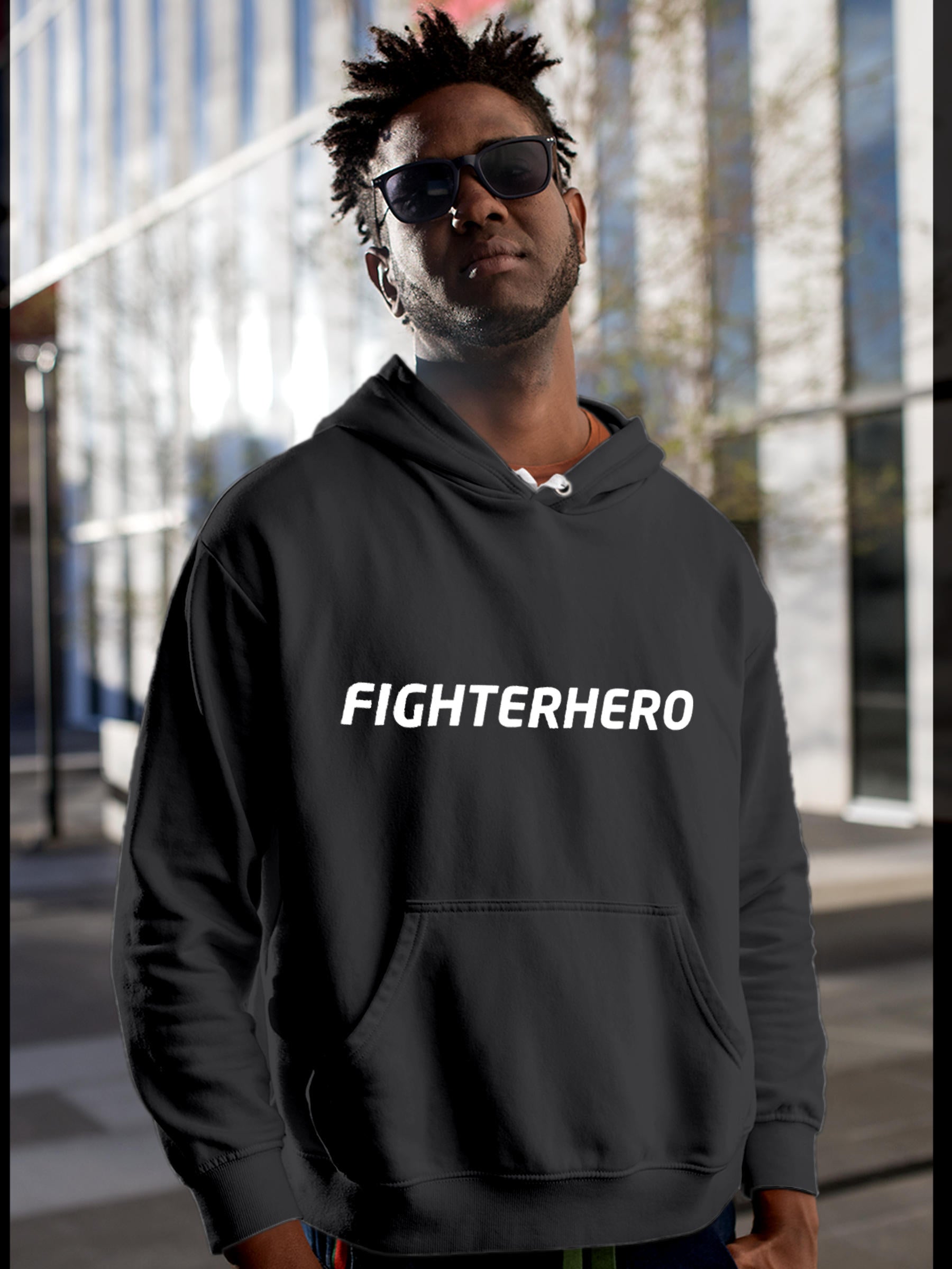 Model wearing Men's Dark Grey Hoodie Sweatshirt with 'Fighterhero' design, offering effortless style and premium comfort