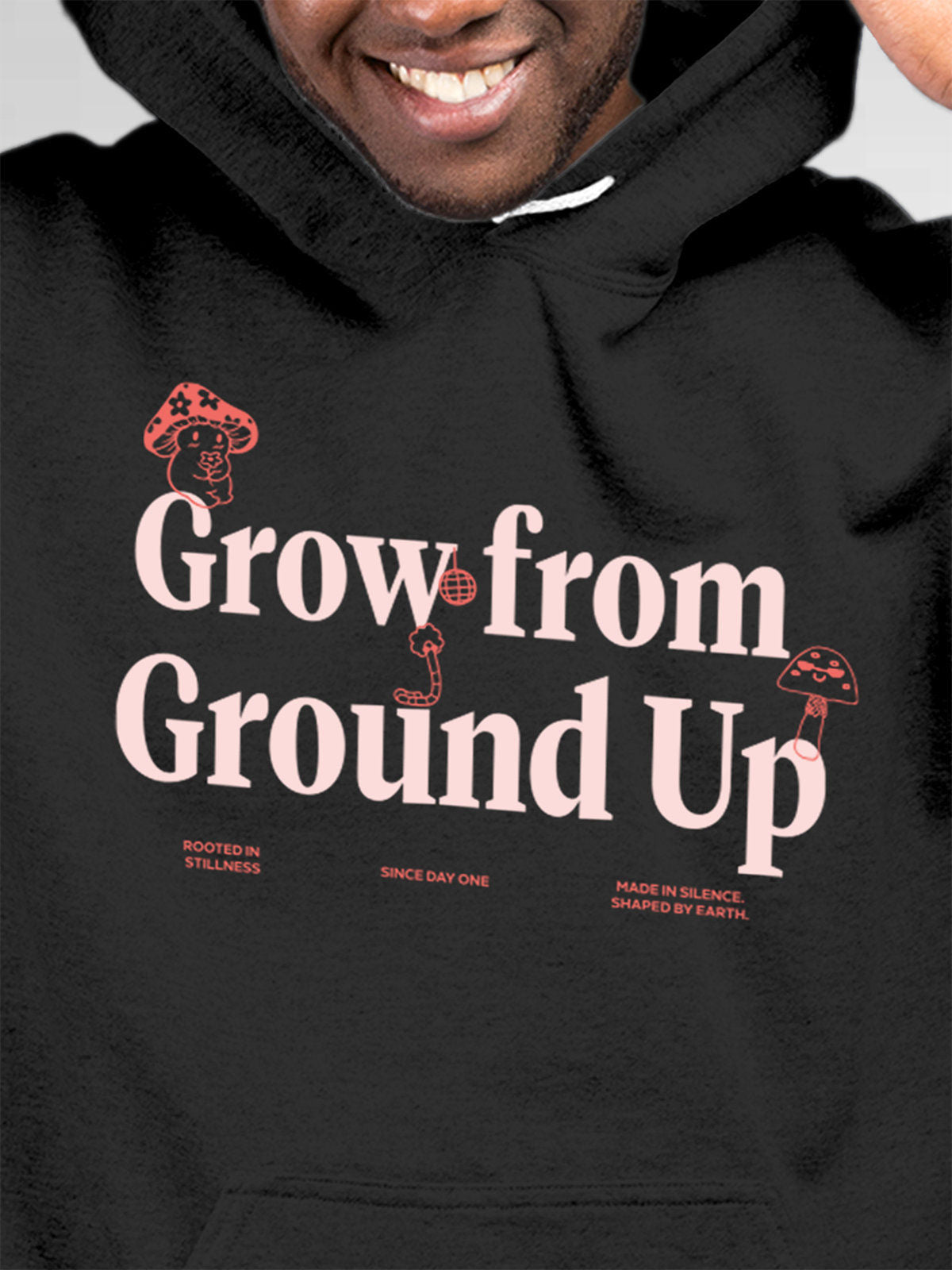 Close up of 'Grow From Ground Up' design on Men's Dark Grey Hoodie Sweatshirt, highlighting intricate details and vibrant print.