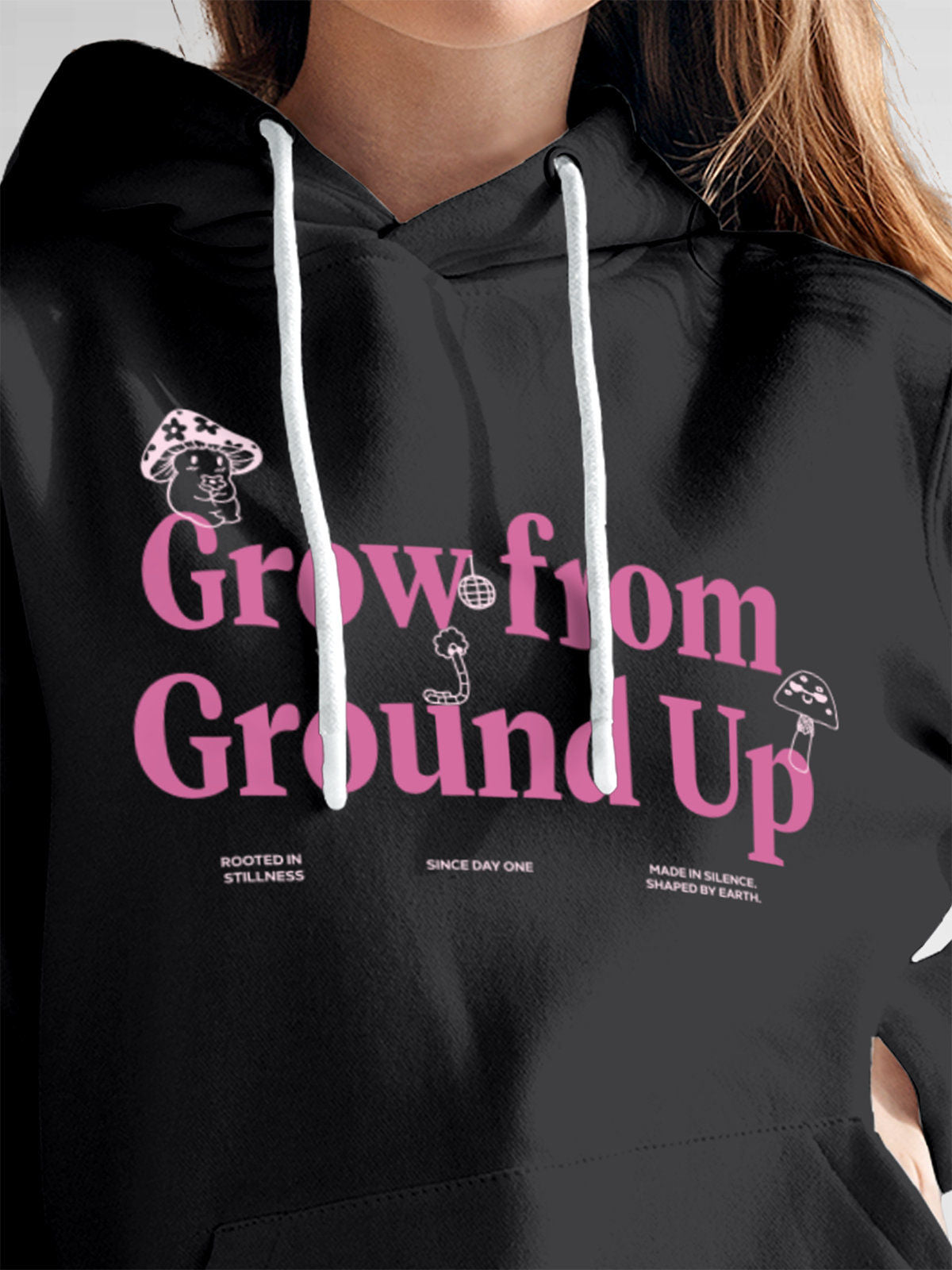 Close up of 'Grow From Ground Up' design on Women's Dark Grey Hoodie Sweatshirt, highlighting intricate details and vibrant print.