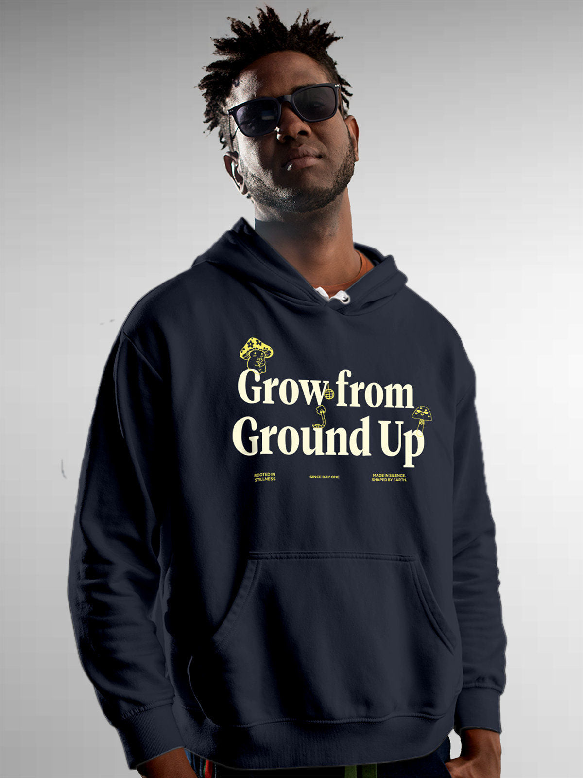 Model wearing Men's Navy Blue Hoodie Sweatshirt with 'Grow From Ground Up' design, offering effortless style and premium comfort