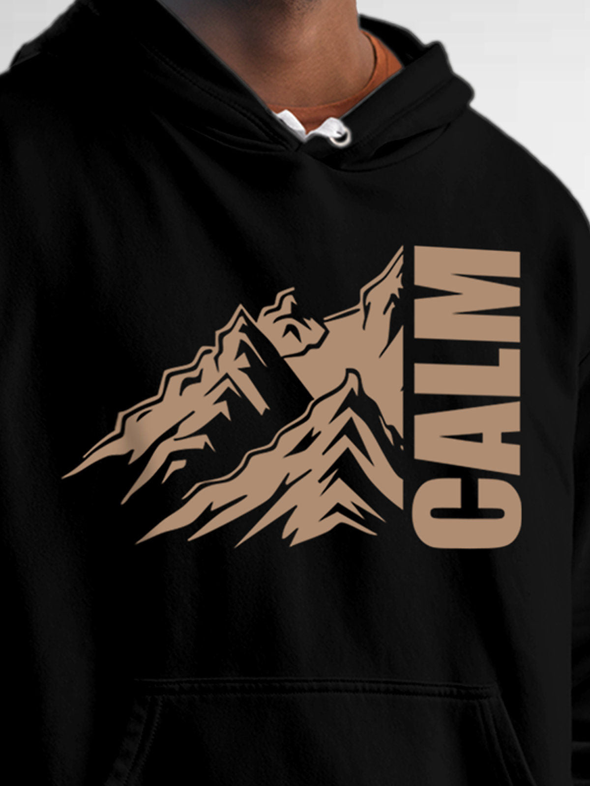 Close up of 'Calm' design on Men's Black Hoodie Sweatshirt, highlighting intricate details and vibrant print.