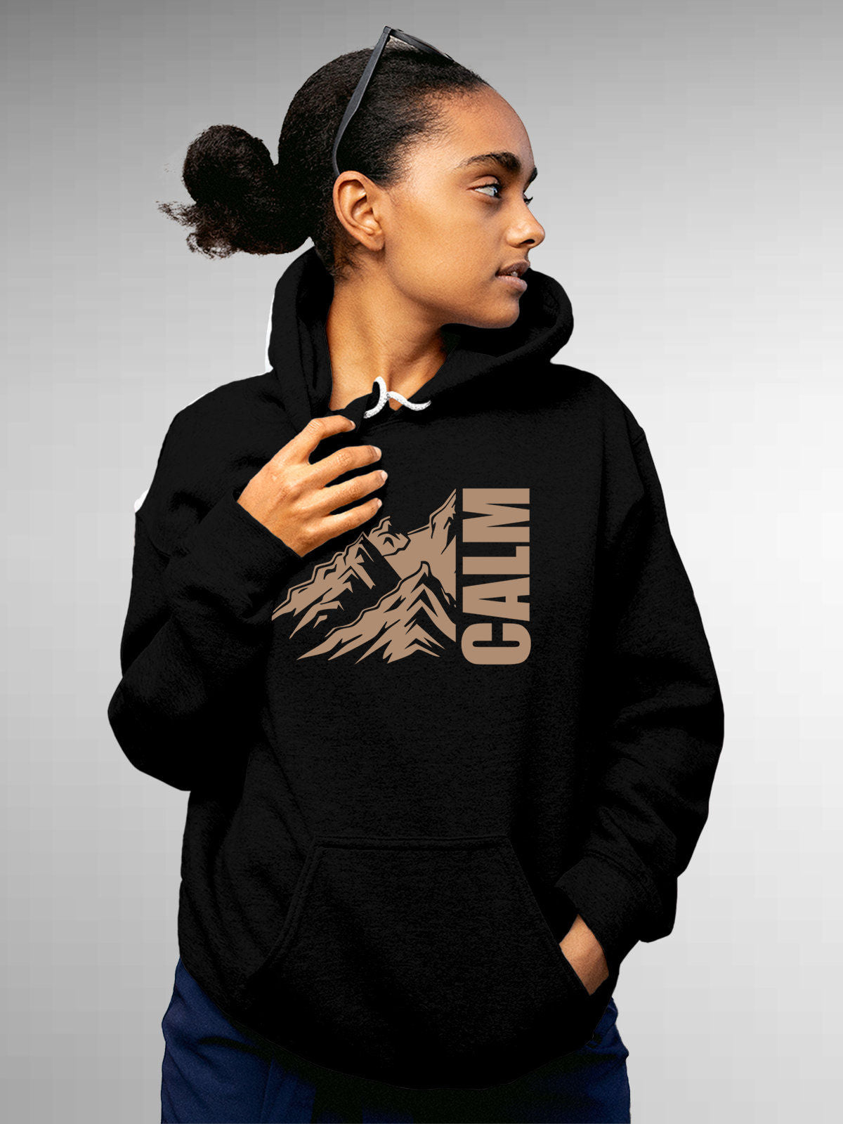 Model wearing Women's Black Hoodie Sweatshirt with 'Calm' design, offering effortless style and premium comfort