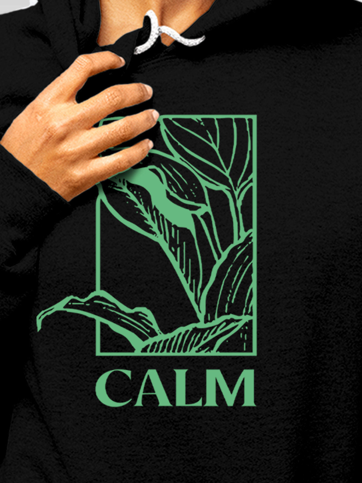 Close up of 'Calm' design on Women's Black Hoodie Sweatshirt, highlighting intricate details and vibrant print.